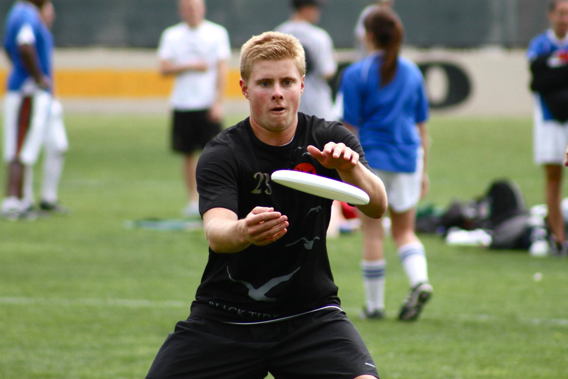 Ultimate Frisbee Player In Dynamic Action Background