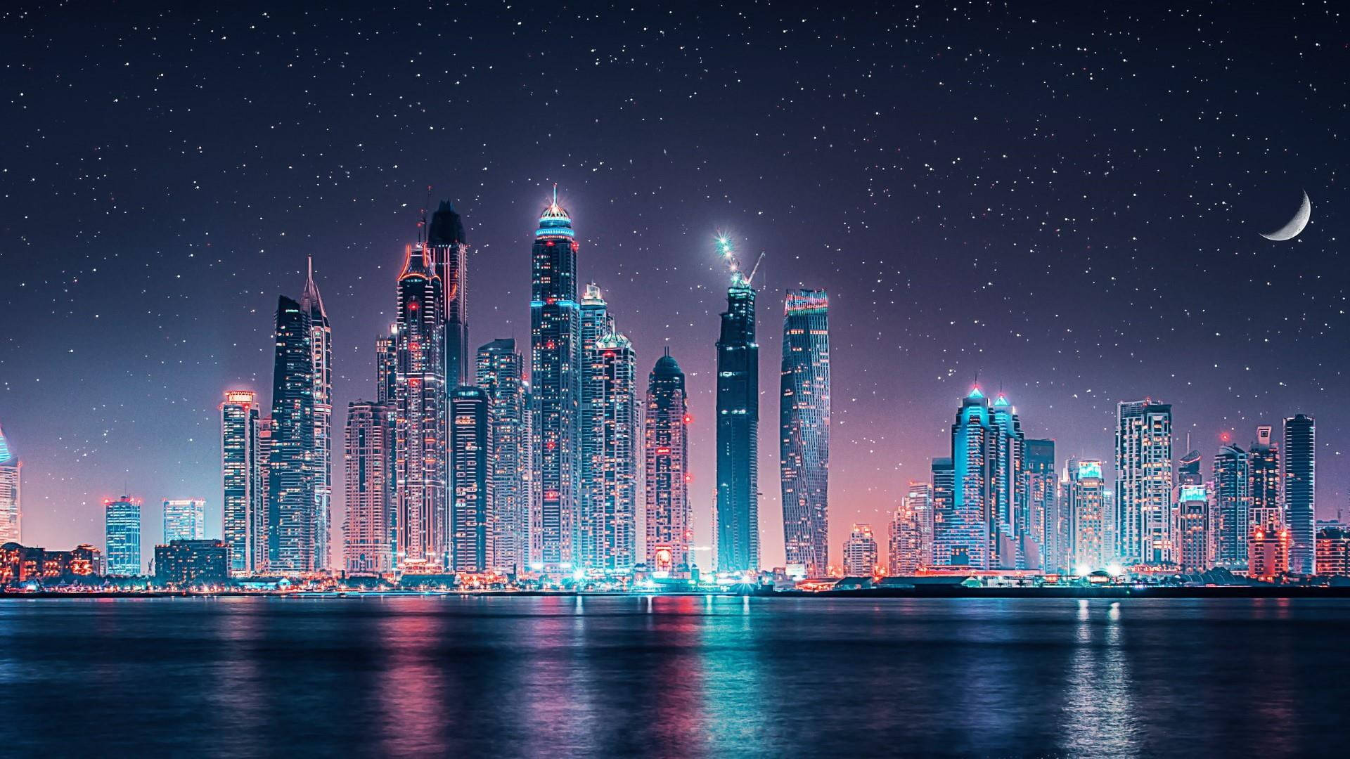 Ultra Hd Dubai Skyline Under Stars Laptop Background