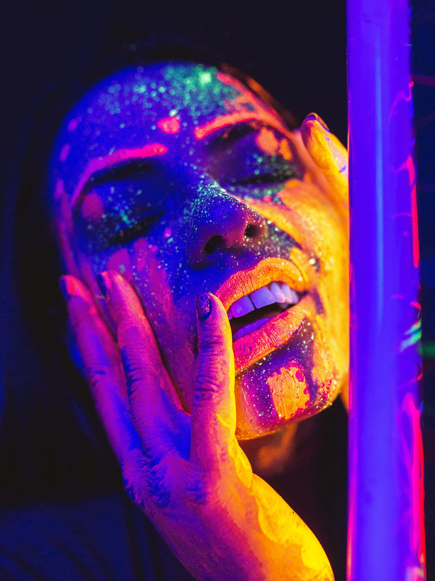 Ultraviolet Face Against A Wall Background