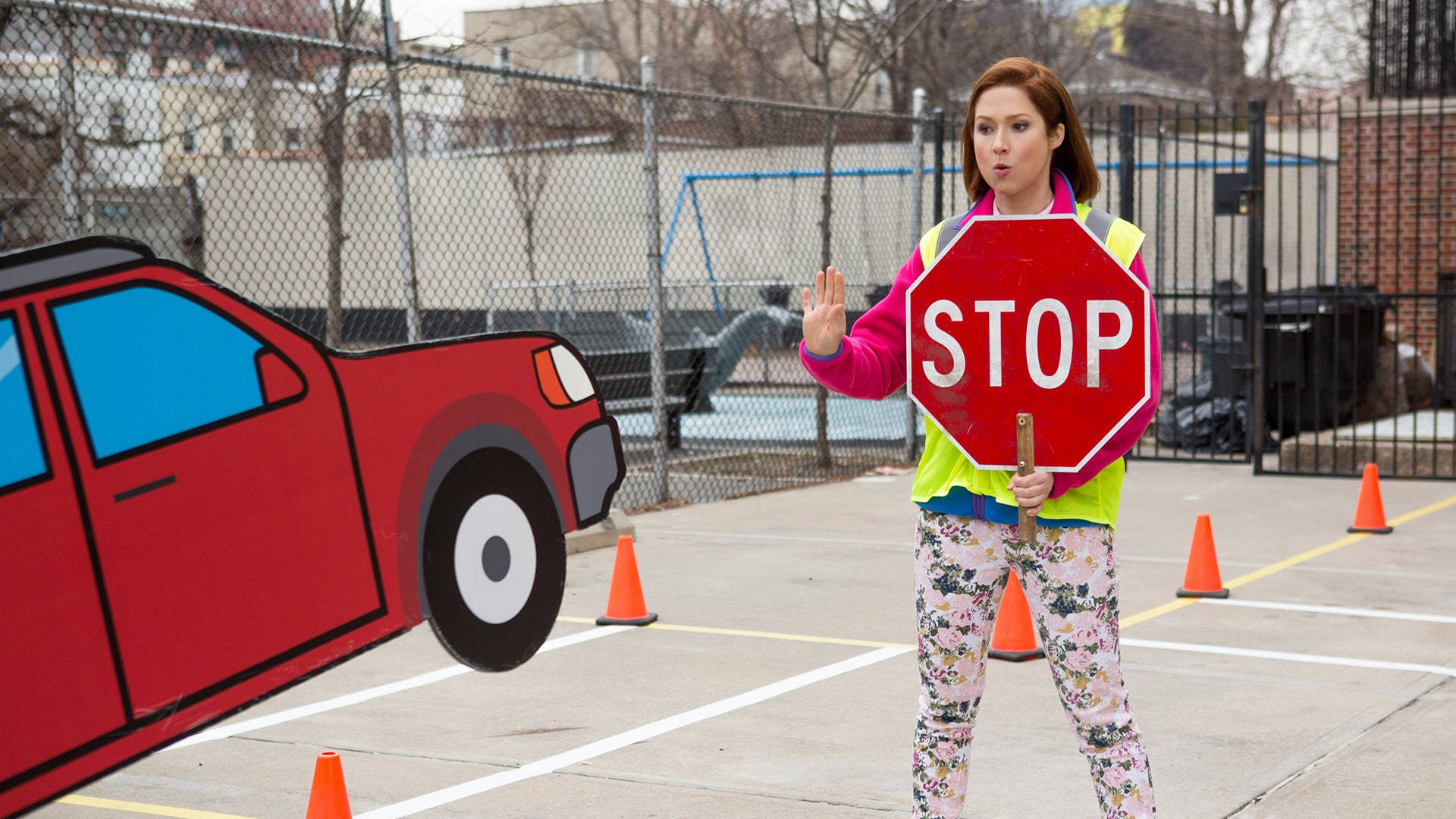 Unbreakable Kimmy Schmidt Kimmy With Stop Signage Background