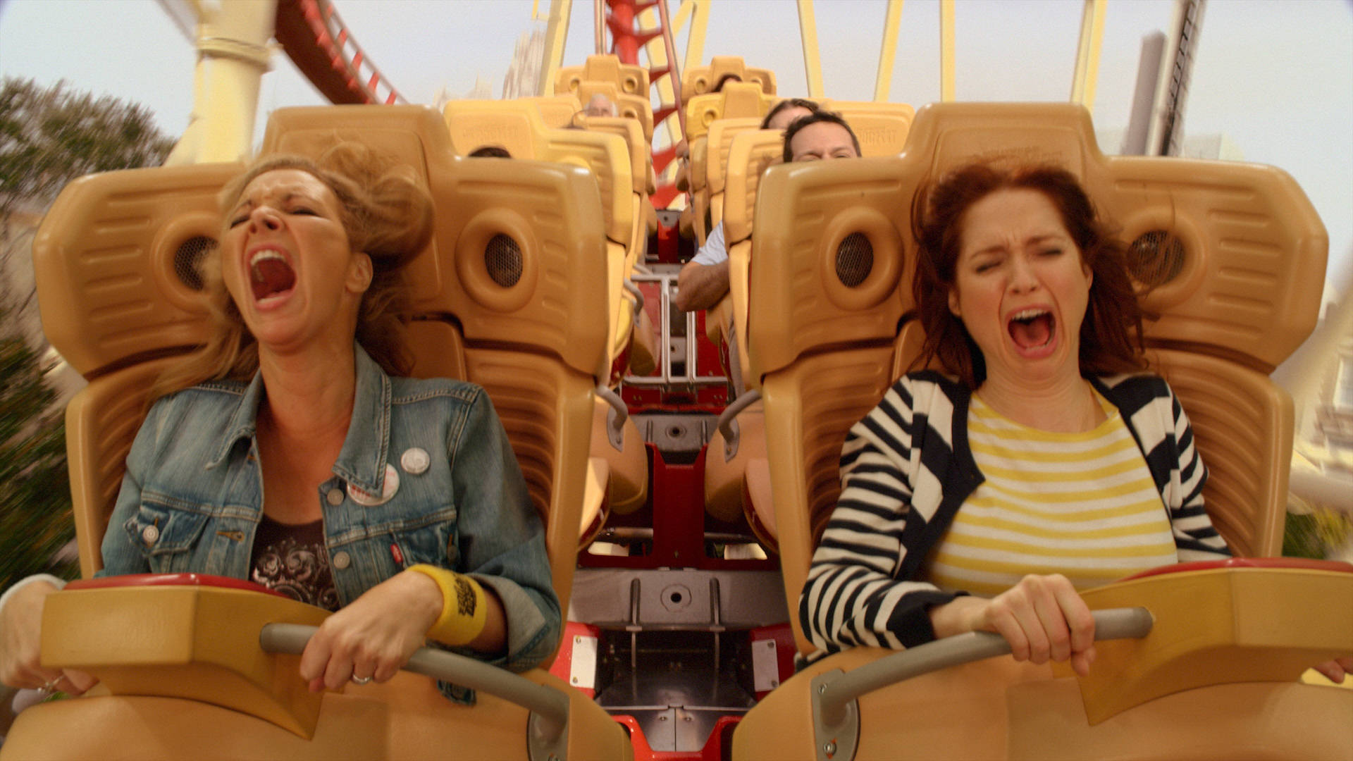 Unbreakable Kimmy Schmidt Riding Roller Coaster Background