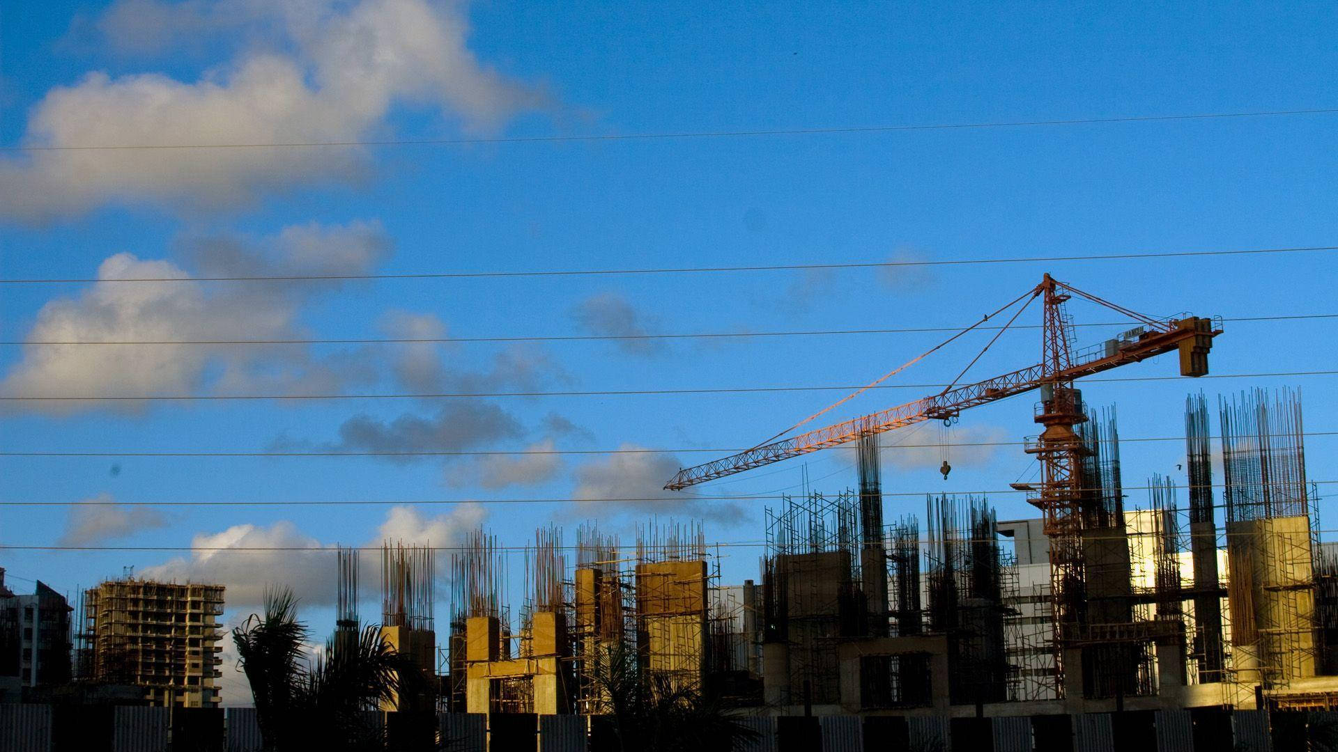 Under Construction Buildings With Crane Operator