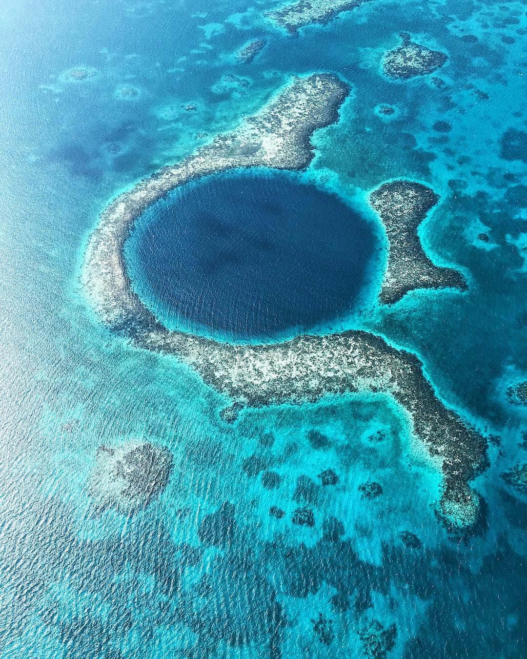 Unearthly Beauty Of The Great Blue Hole, A Unesco World Heritage Site Background