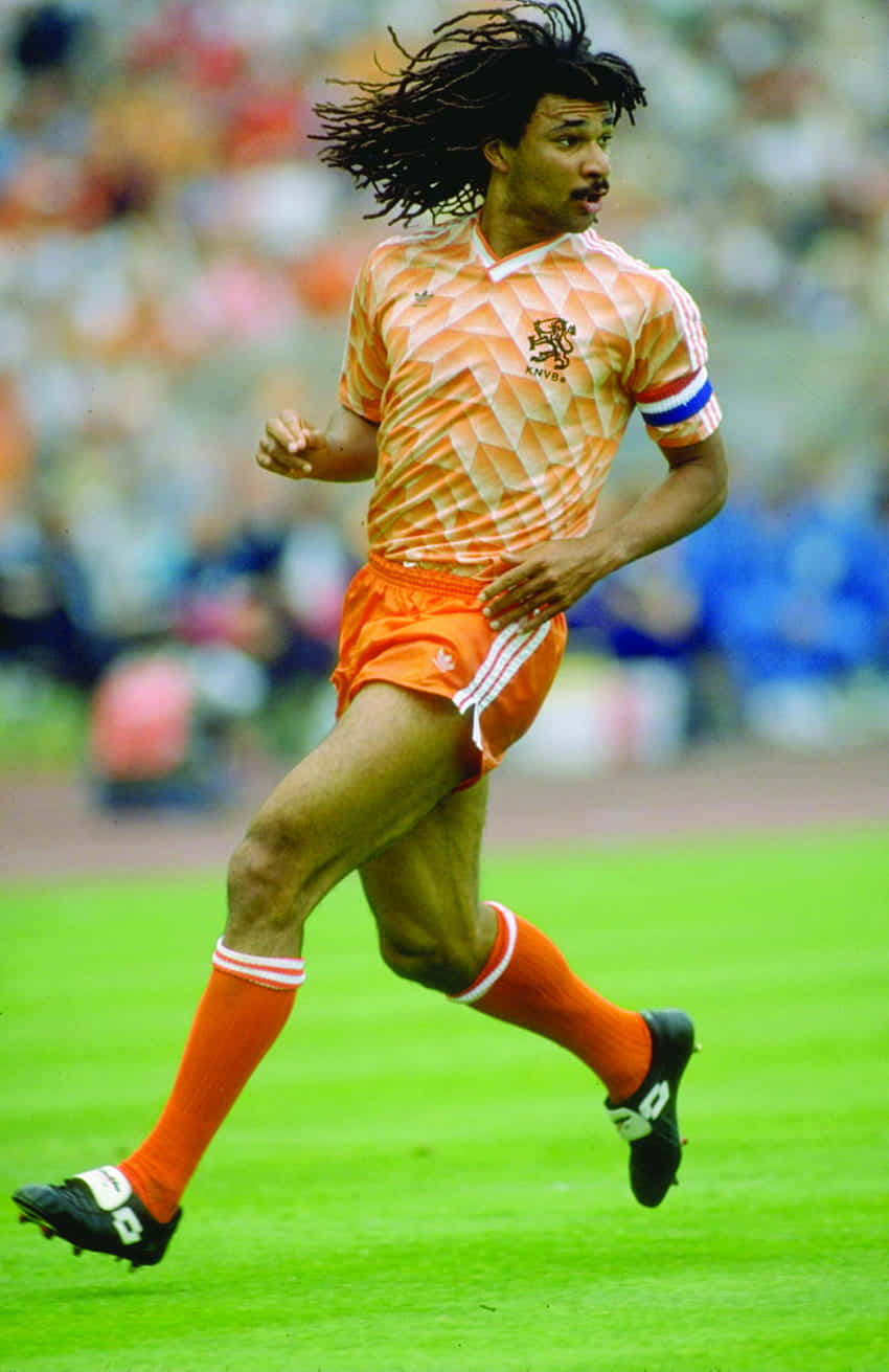 Unforgettable Moments On The Field With Football Legend Frank Rijkaard Background