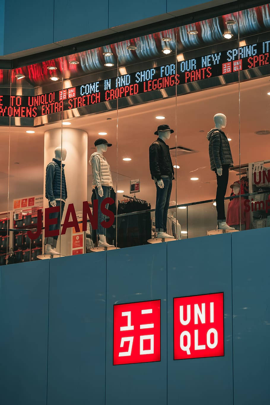 Uniqlo Mannequins On Glass Panel