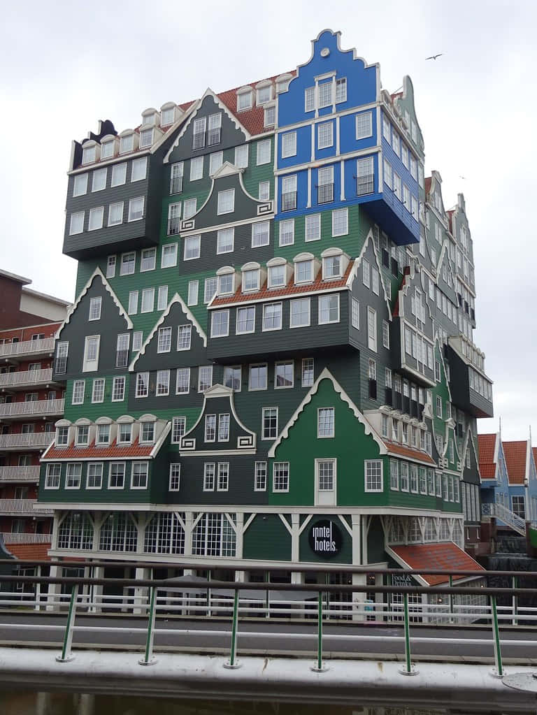 Unique Architecture Inntel Hotel Zaandam, The Netherlands - Capturing A Flying Bird. Background