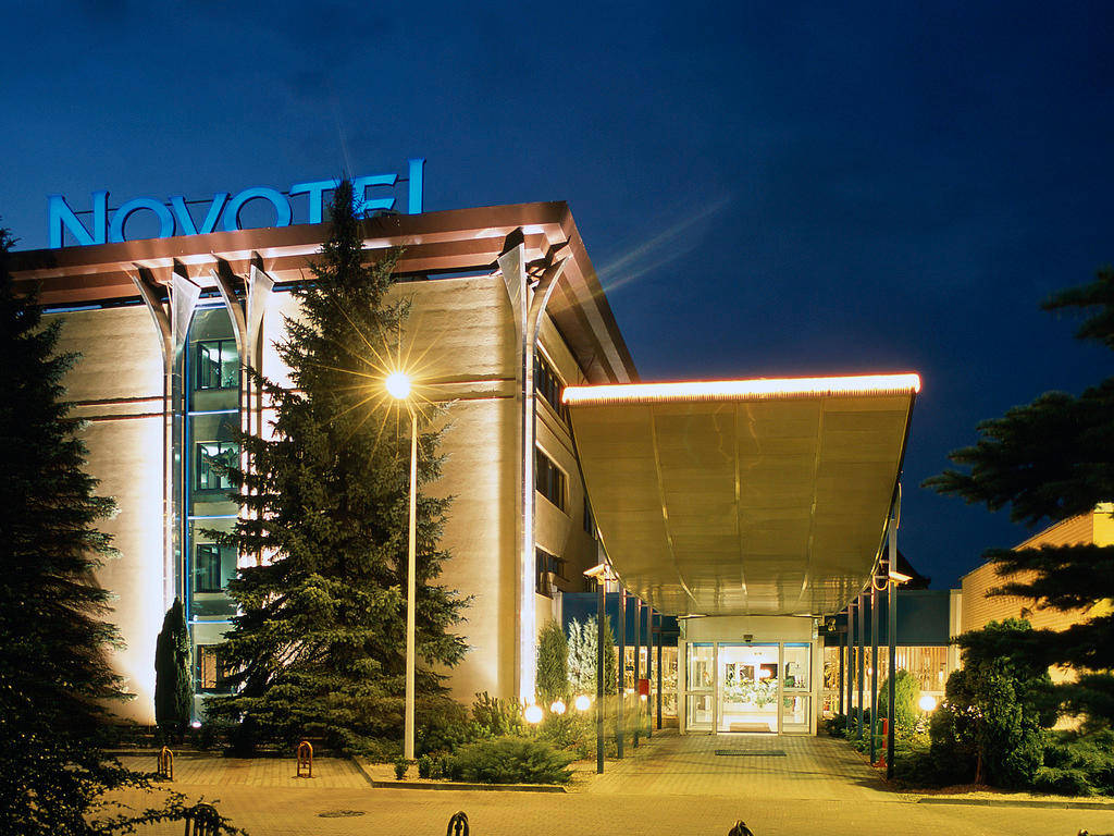 Unique Architecture Of Novotel Gdansk Centrum Near The Iconic Crooked House Background