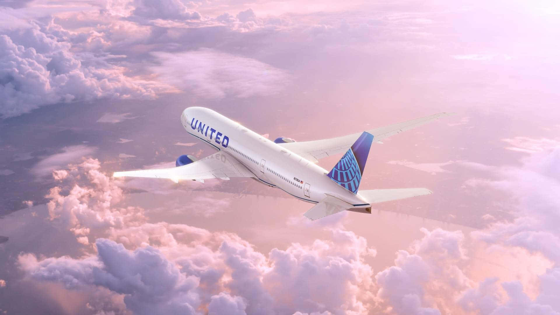 United Airlines - A Jet Flying Through The Clouds Background