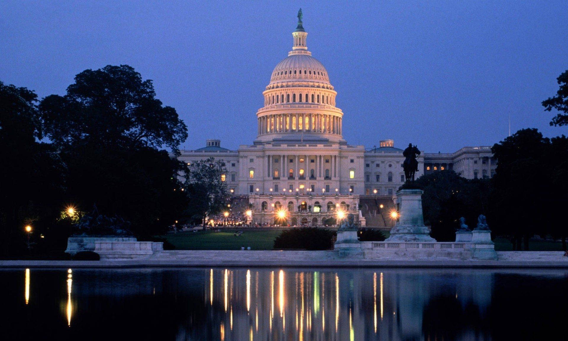 United States Capitol Illuminated Under Starry Night Sky