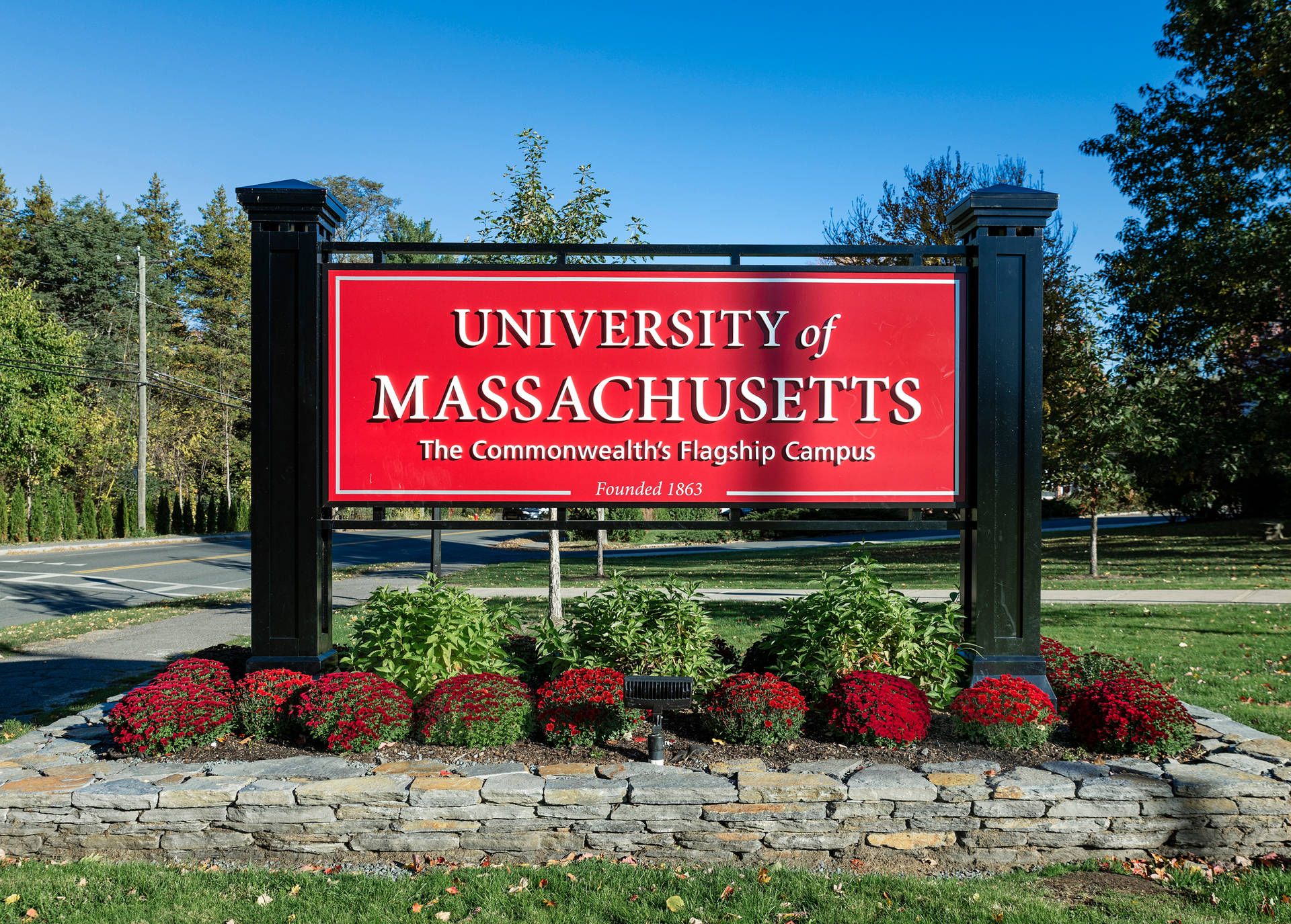 University Of Massachusetts Welcome Sign Background