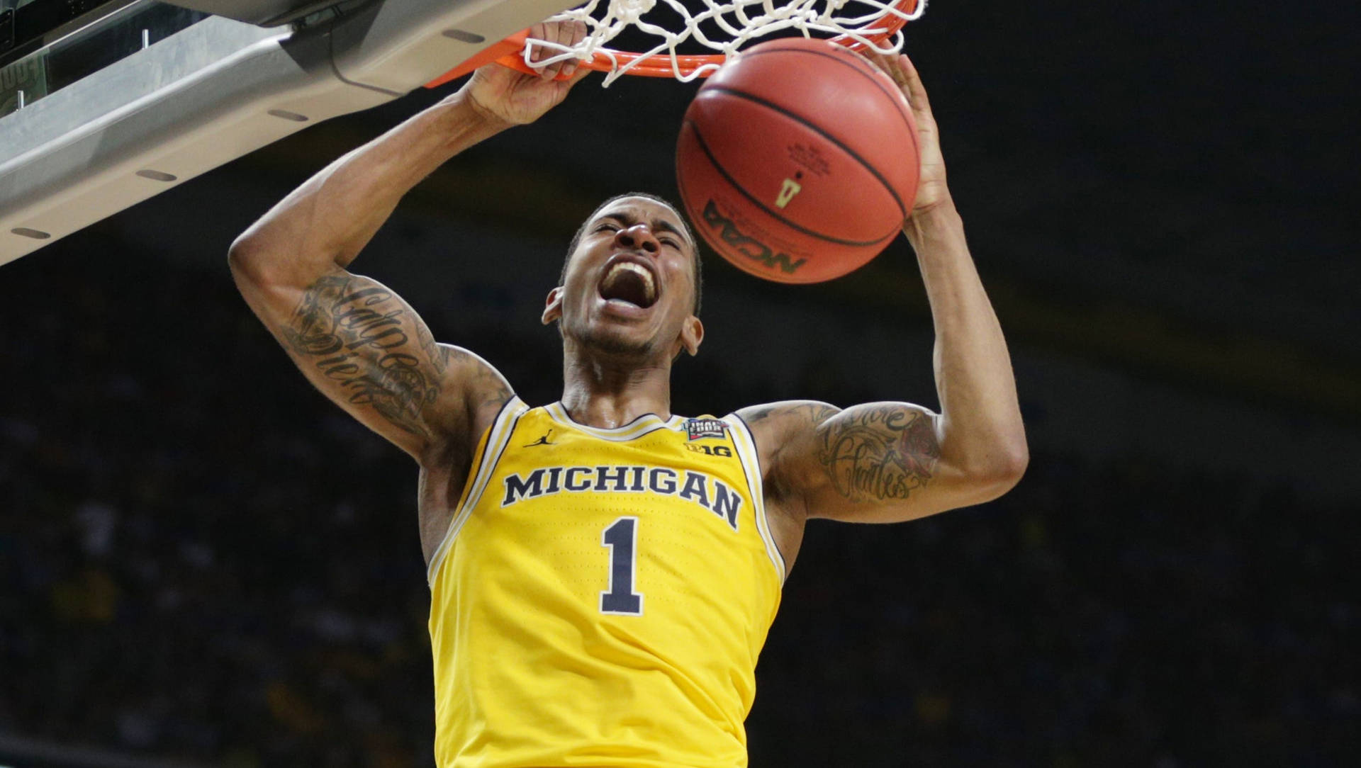 University Of Michigan-ann Arbor Basketball Dunk Background