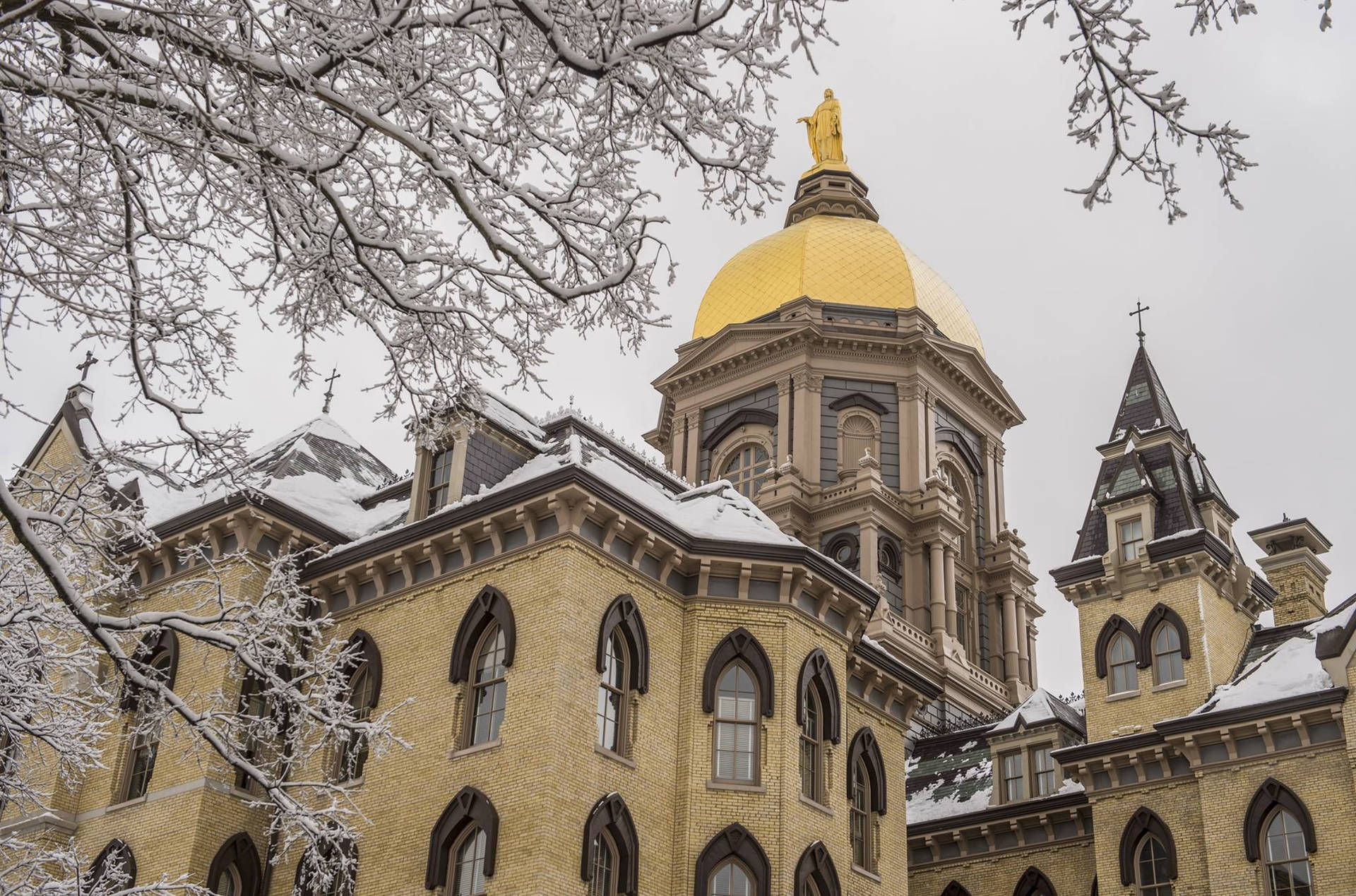 University Of Notre Dame With Snow Background