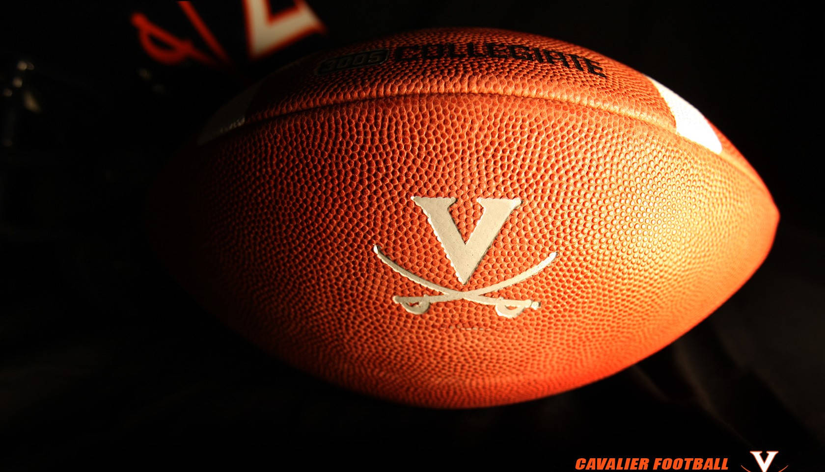 University Of Virginia Logo On Football Background