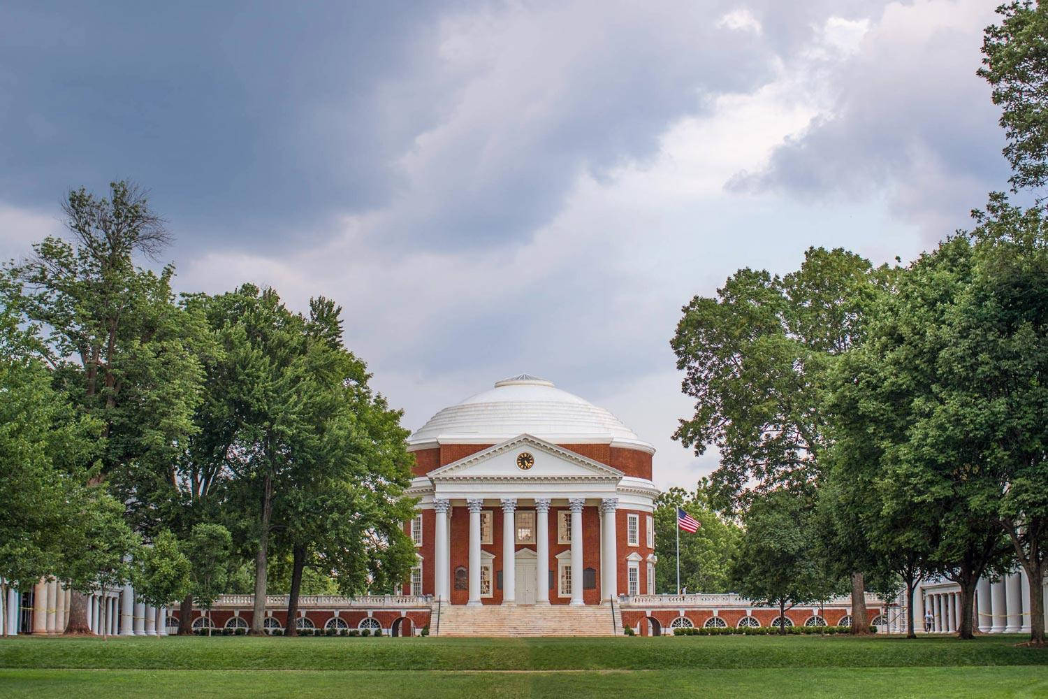 University Of Virginia's Historic Rotunda Under Cloudy Sky Background