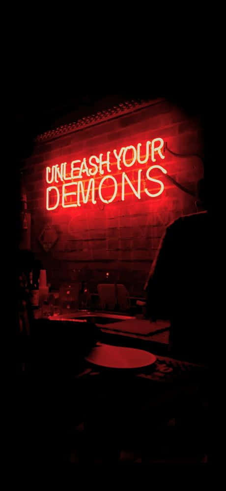 Unleash Your Demons Neon Sign Background