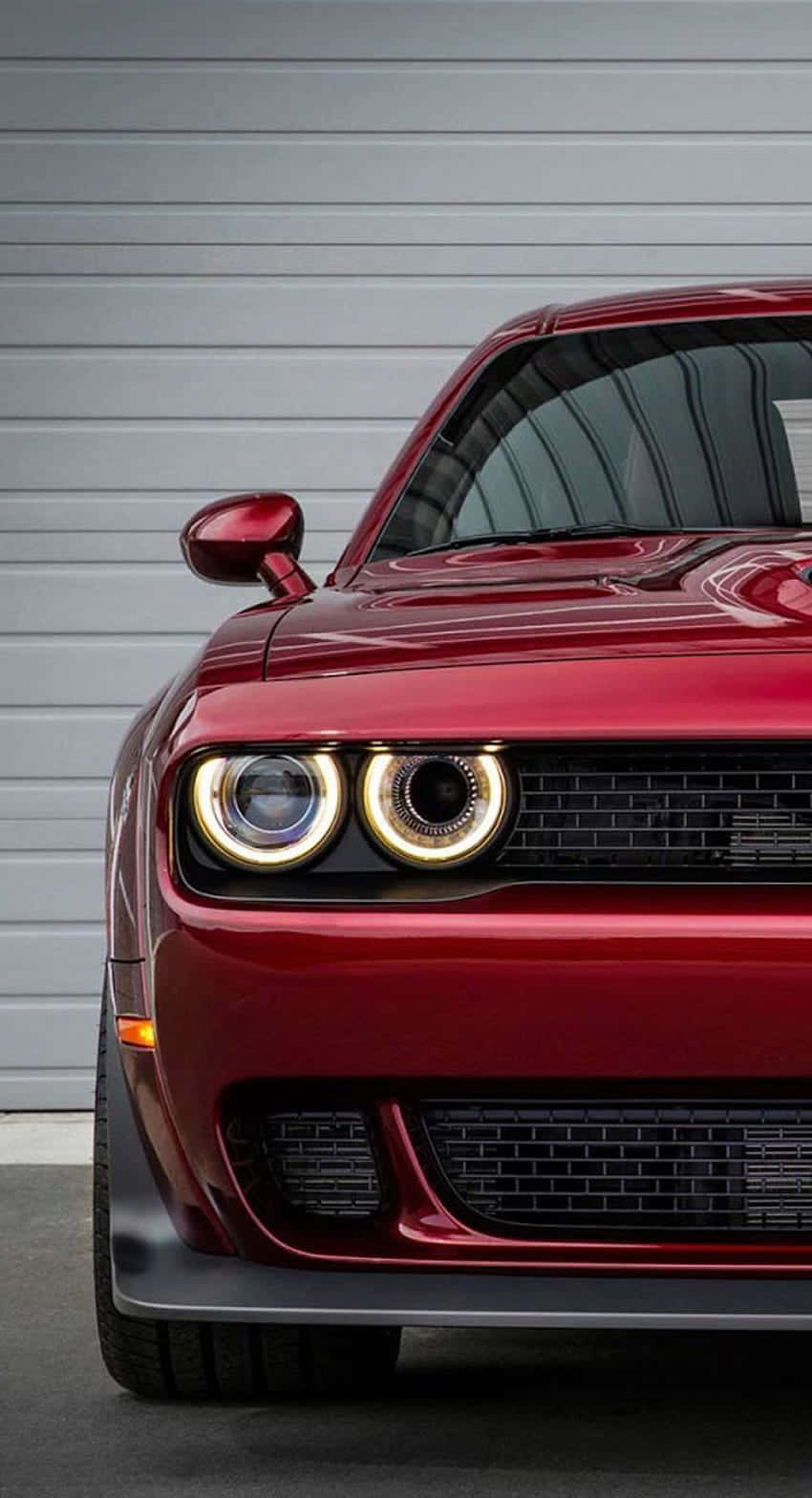 Unlock The Exciting And Thrilling Features Of The Hellcat Iphone Background