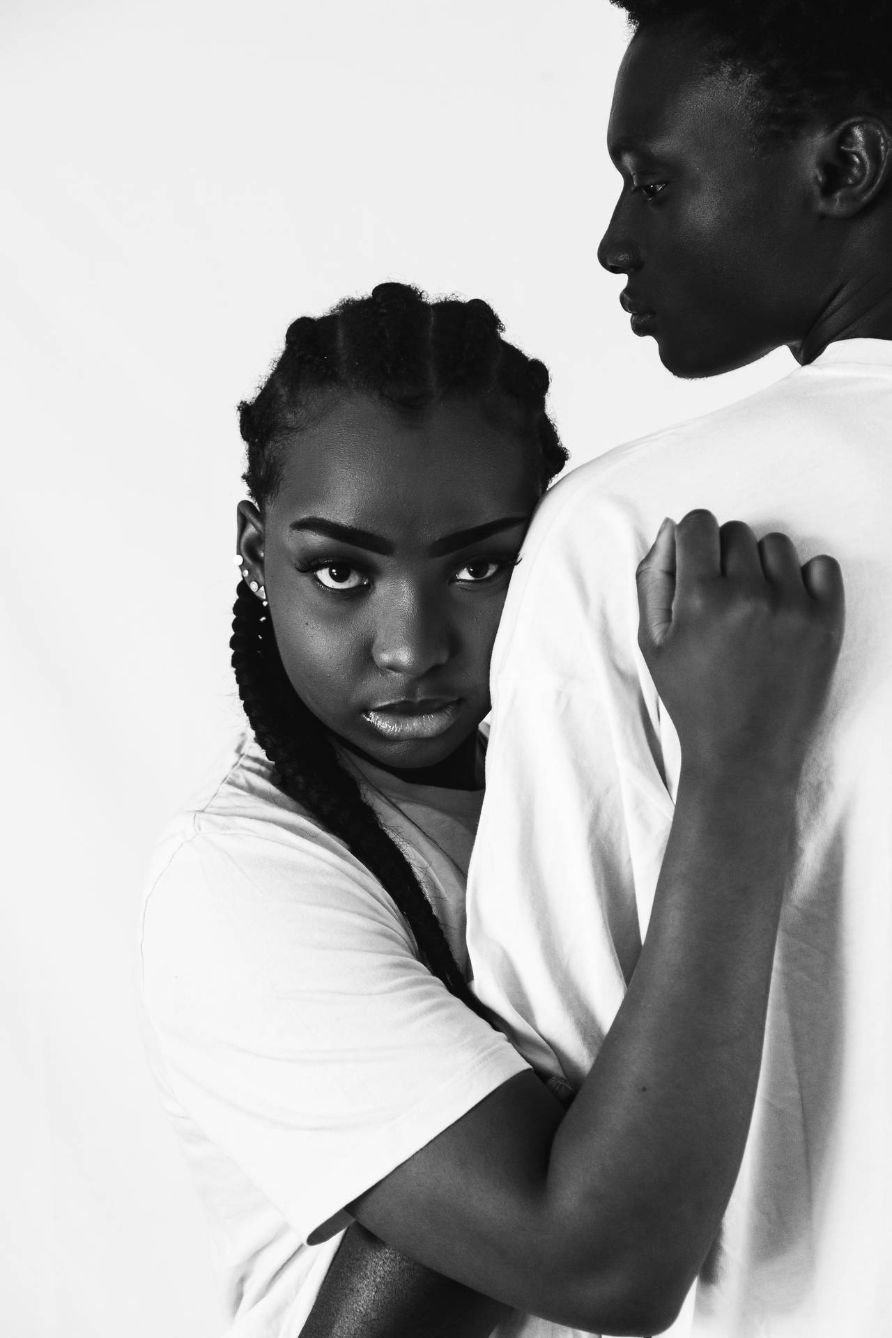 Unwavering Black Love: Embrace Of Strength And Unity Background