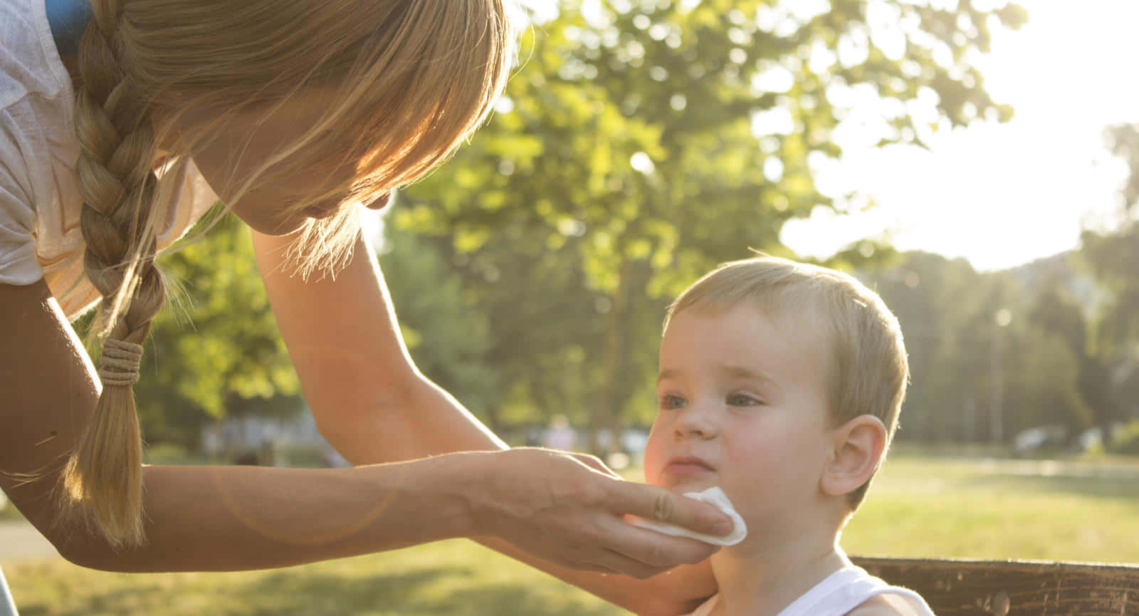 Unwell Child Comforted By Mother