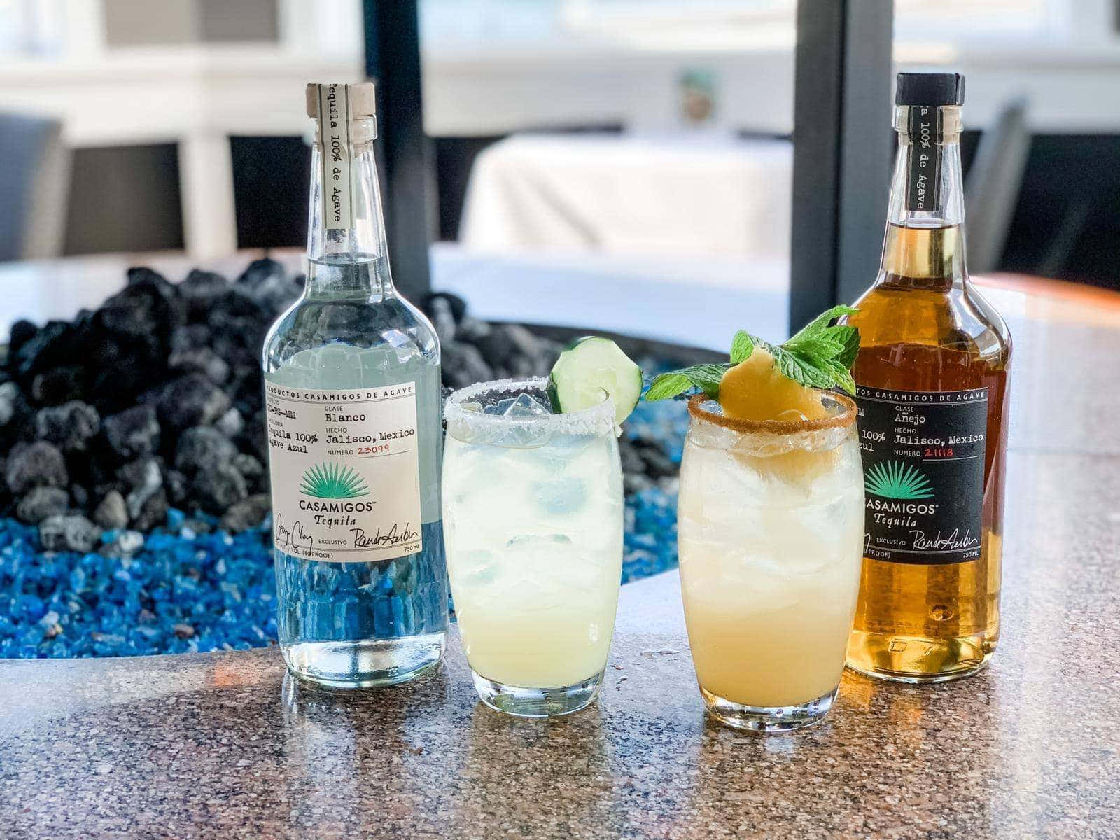 Unwind With Casamigos Tequila: Anejo And Blanco Varieties Served In Cocktails Background