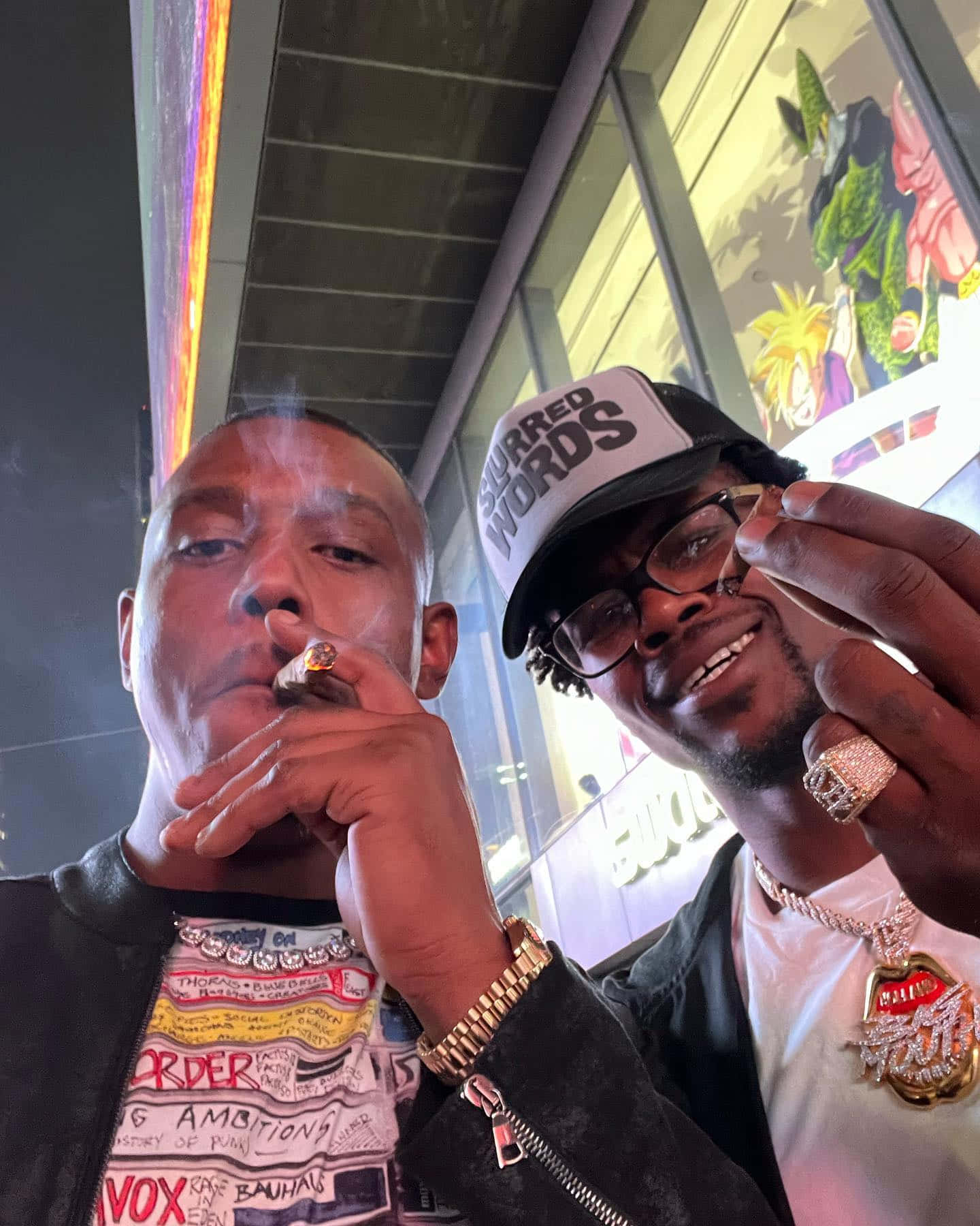Unwinding Moments - Jamahal Hill Engages In A Casual Smoke With Kevin Holland Background
