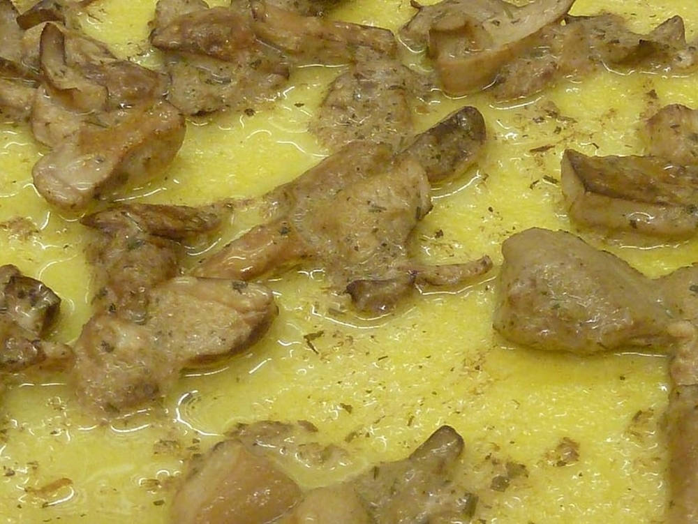 Up-close Look At A Polenta Dish Background