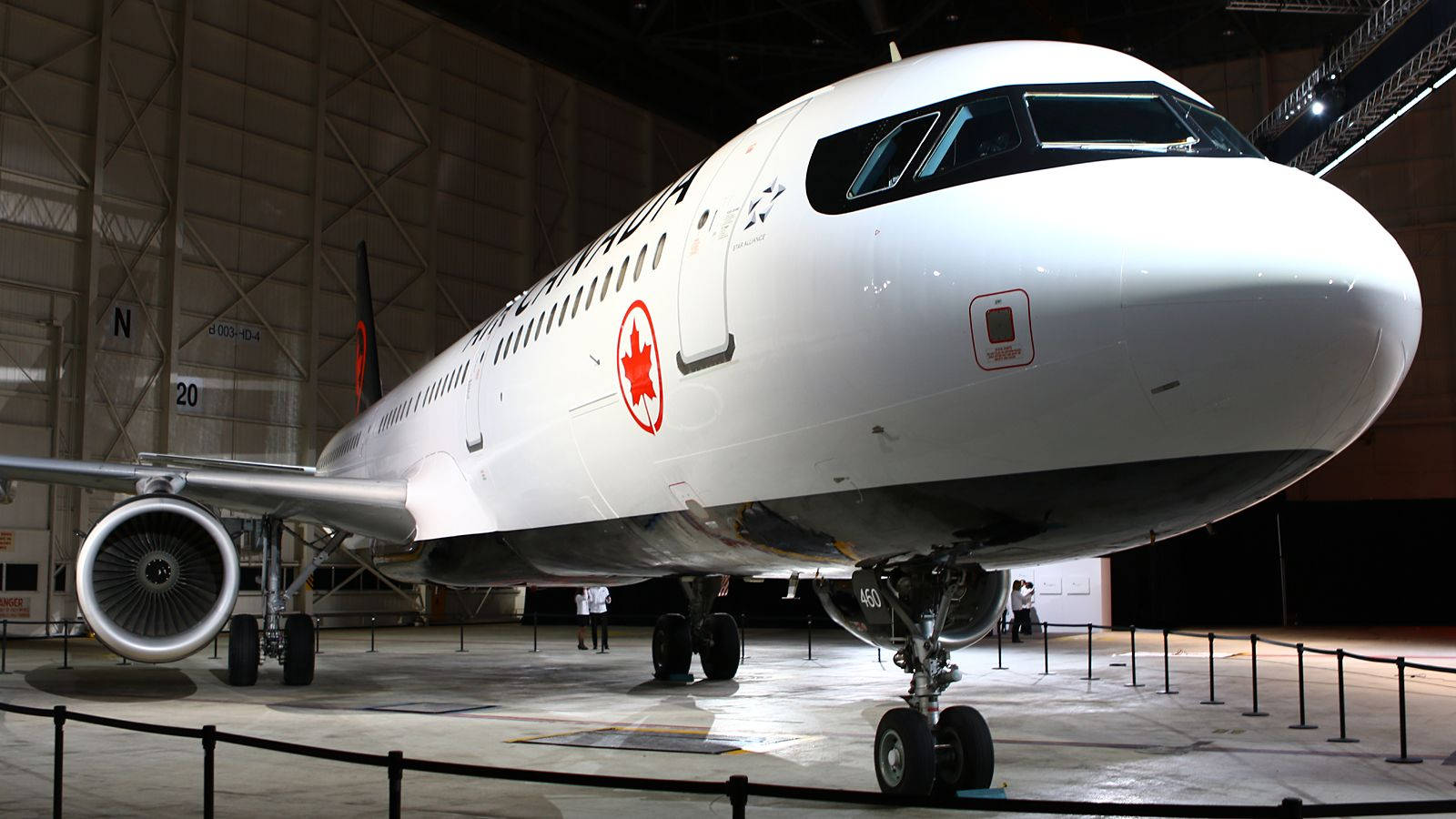 Up Close With Air Canada In The Hangar Background