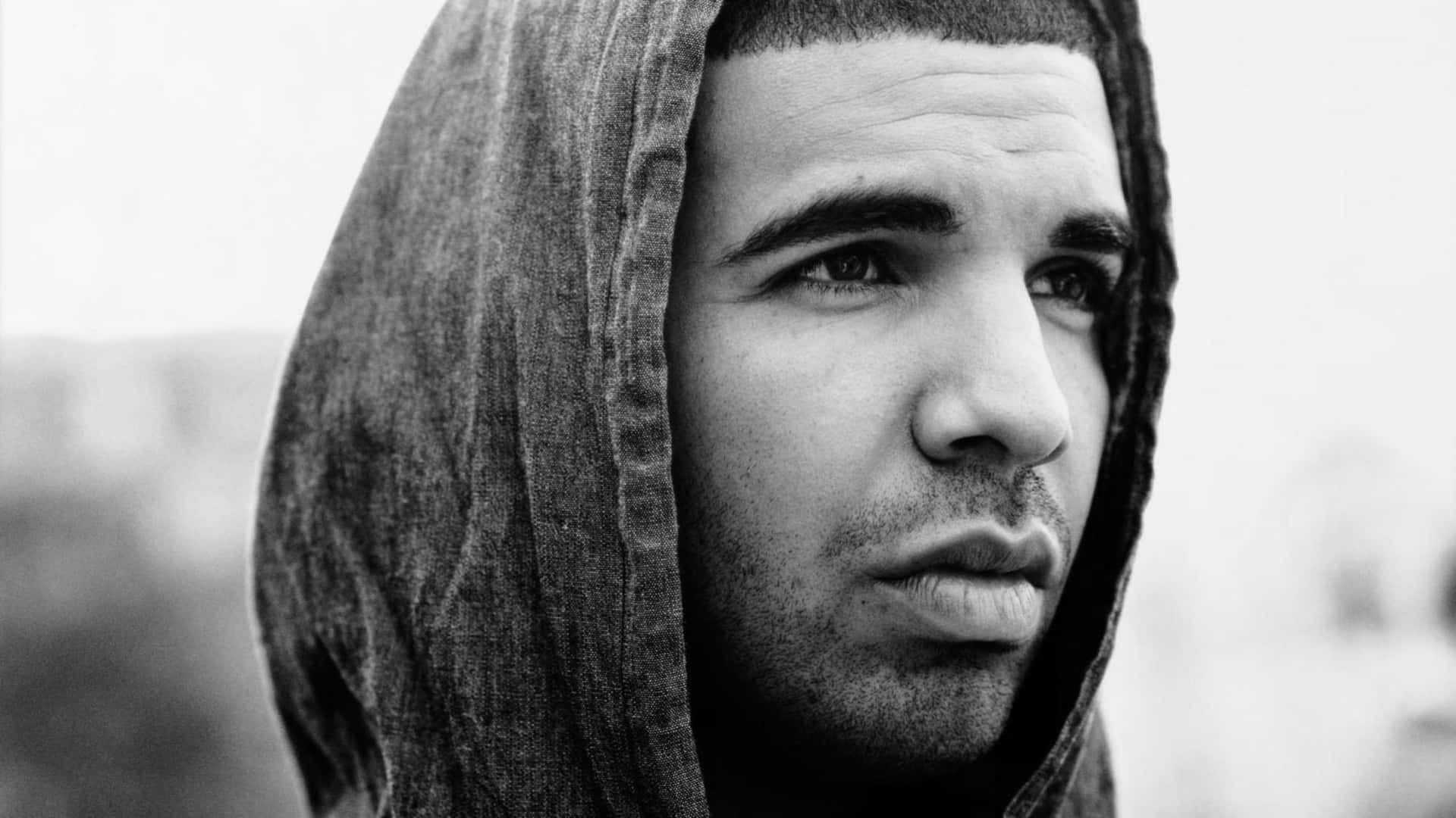 Upgrade Your Performance And Power With Drake Computer Background
