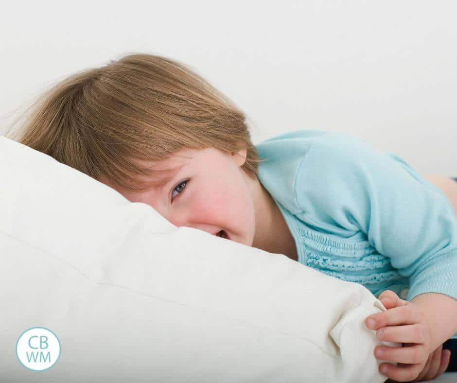 Upset Child Restingon Couch Background