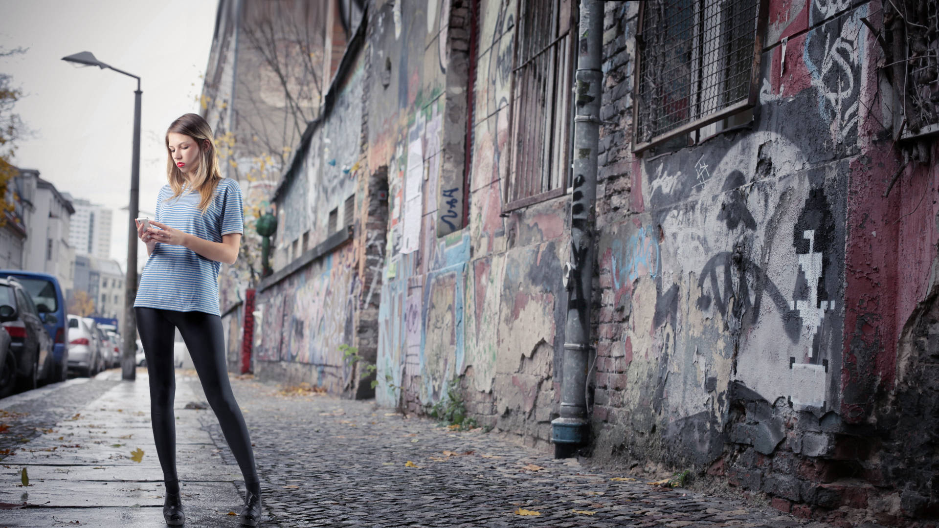 Urban Girl Alone Standing On A Street Background