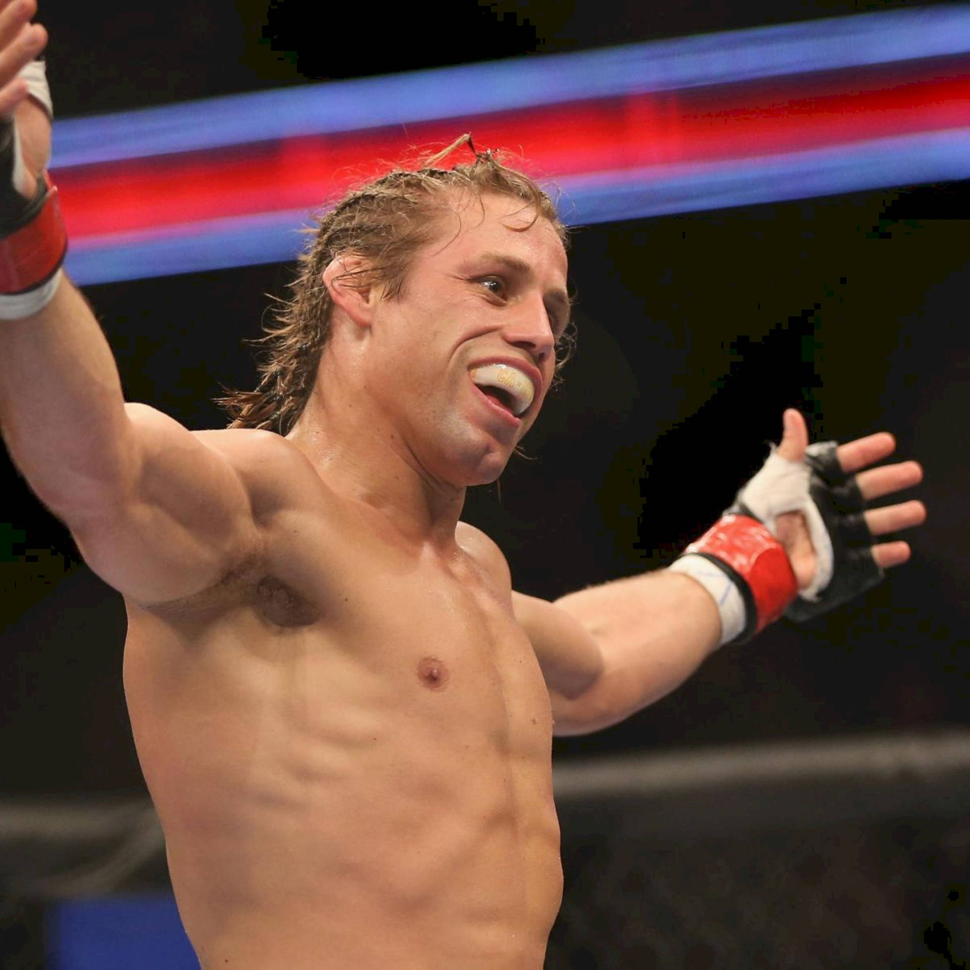 Urijah Faber Smiling And Raising Arms