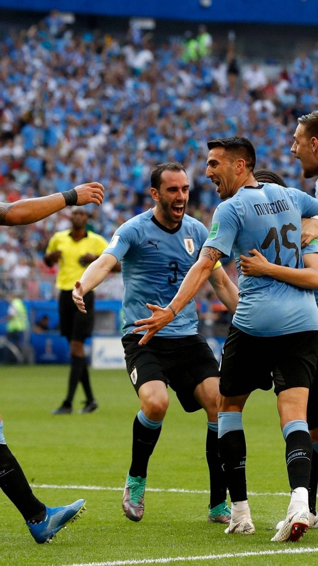Uruguay Football Players Celebrating Background