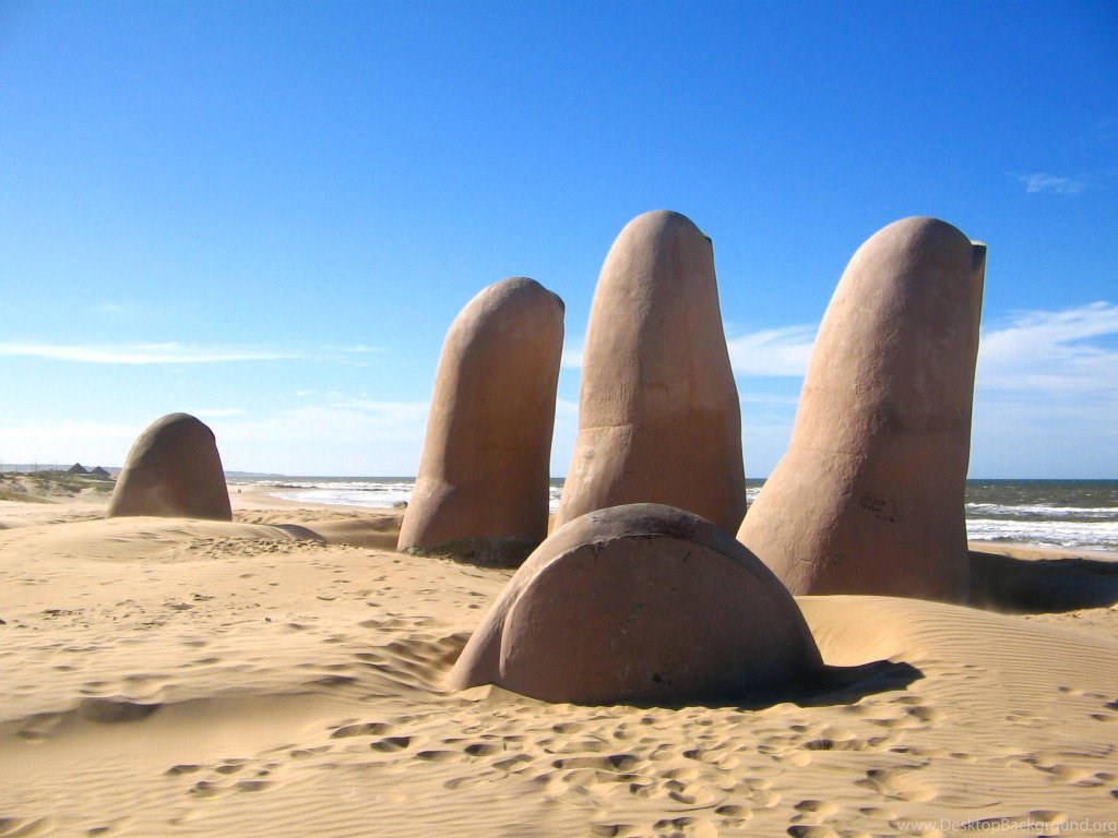 Uruguay Playa Mansa Hand Sculpture Background
