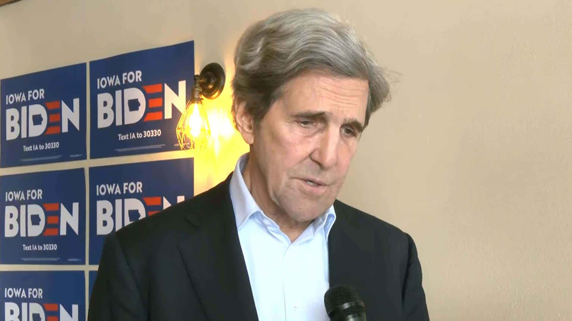 Us Diplomat John Kerry In Deep Thought Background