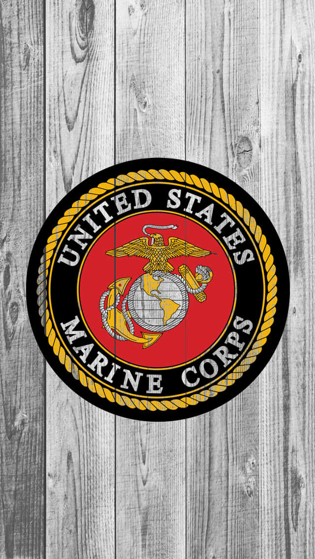 Us Marine Corps Emblem On A Wooden Background Background