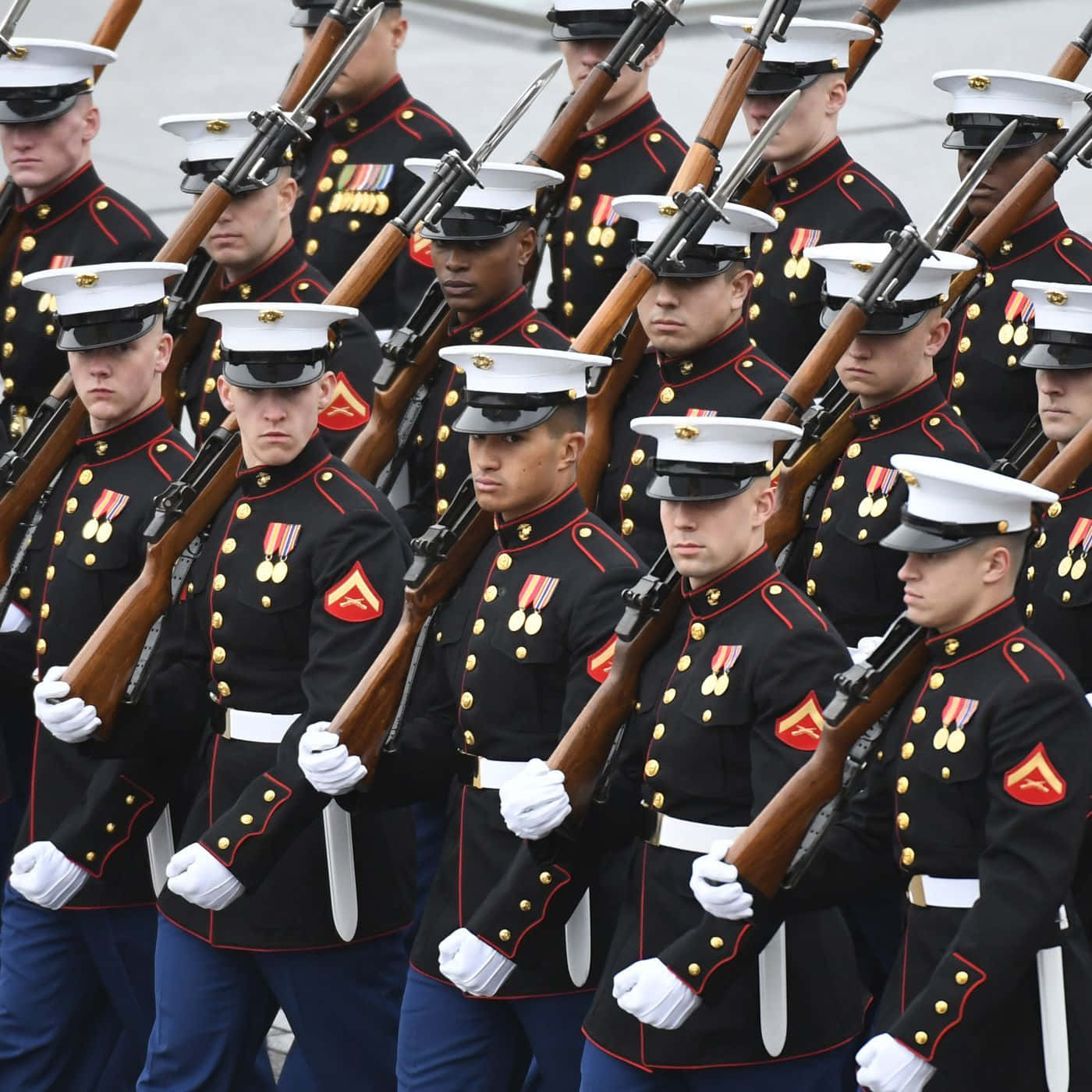 Us Marines Marching In Formation With Rifles Background