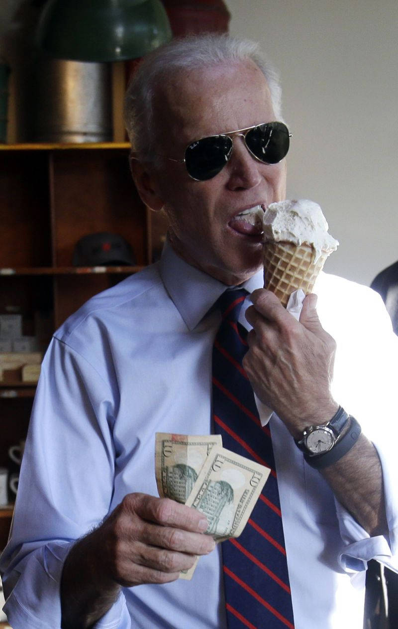 Us President Joe Biden Enjoying An Ice-cream On A Sunny Day
