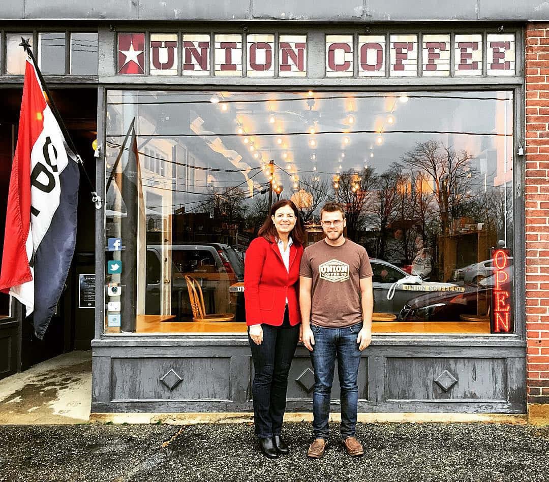 Us Senator Kelly Ayotte Enjoys Coffee Outdoors Background