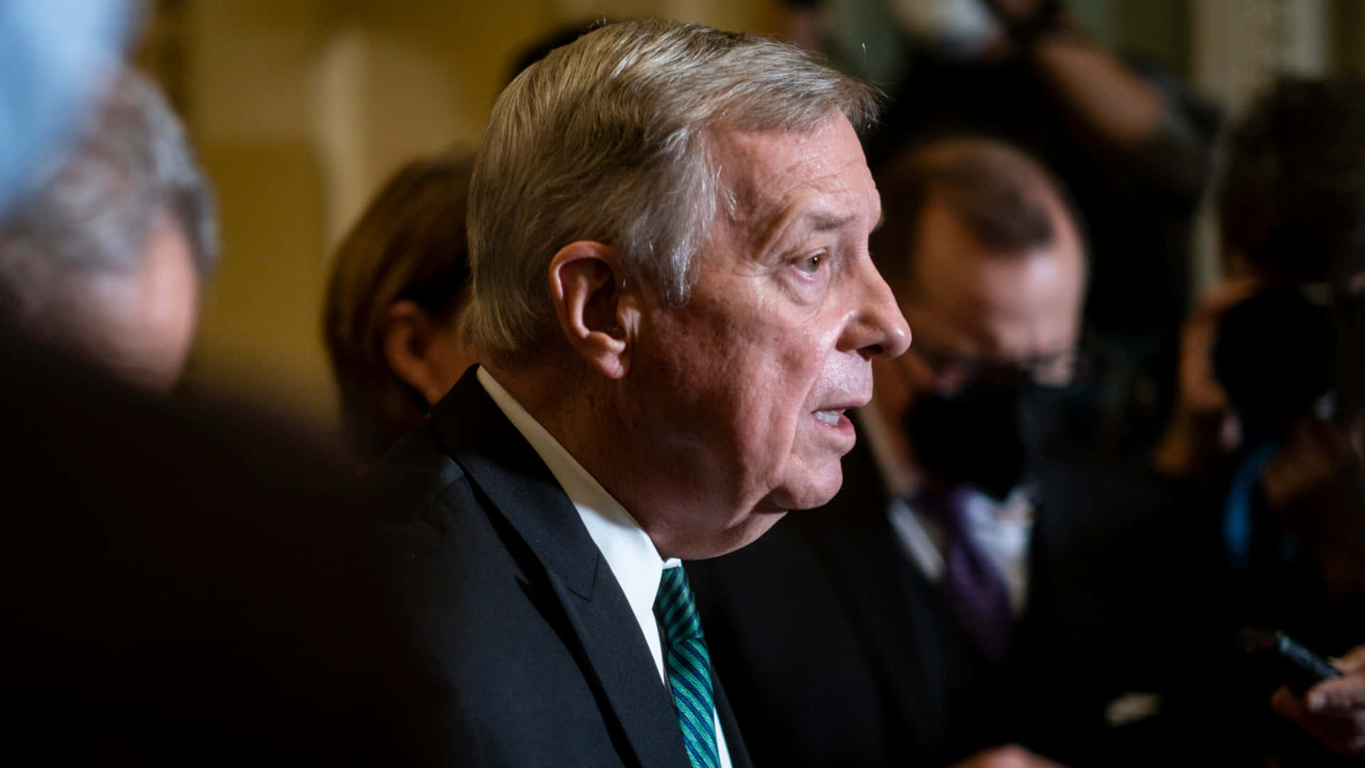 Us Senator Richard Durbin In Side View Background