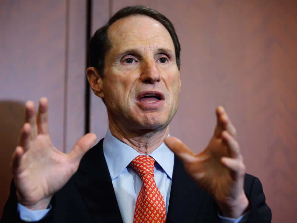 Us Senator Ron Wyden Actively Gesturing During A Speech