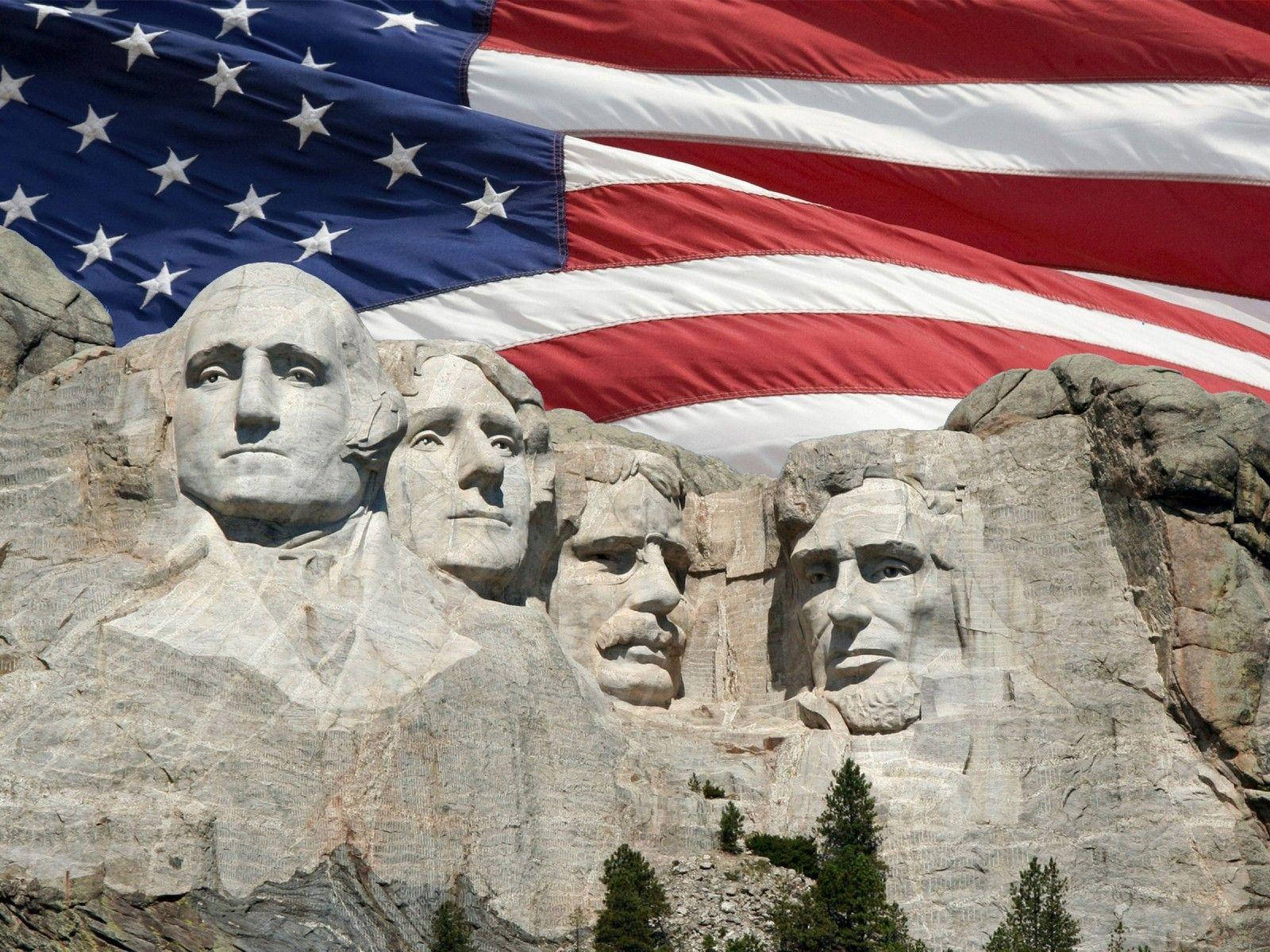 Usa Flag Behind Mount Rushmore