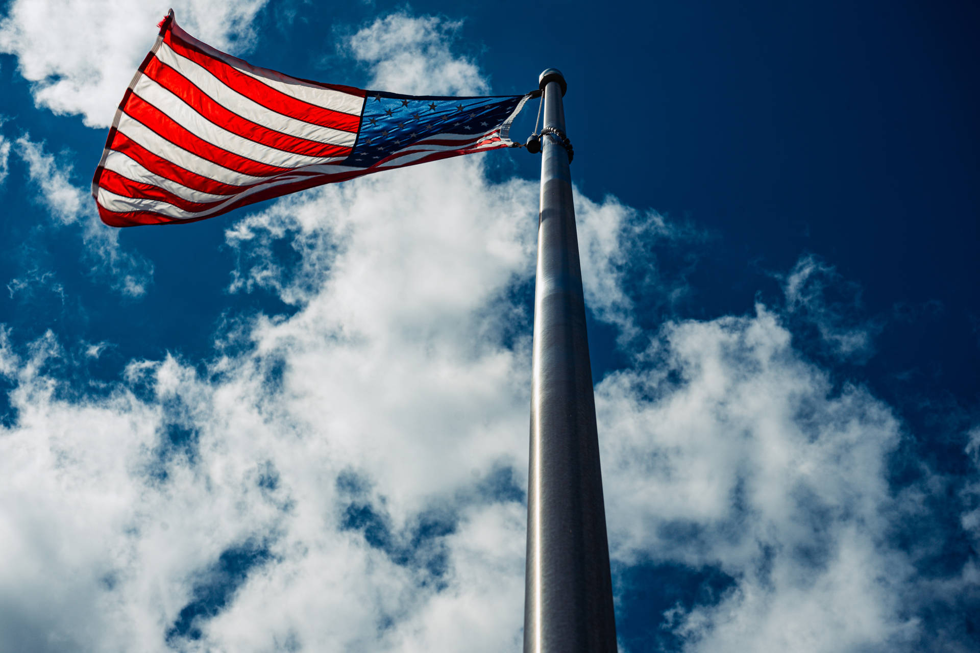 Usa Flag On Tall Pole Background