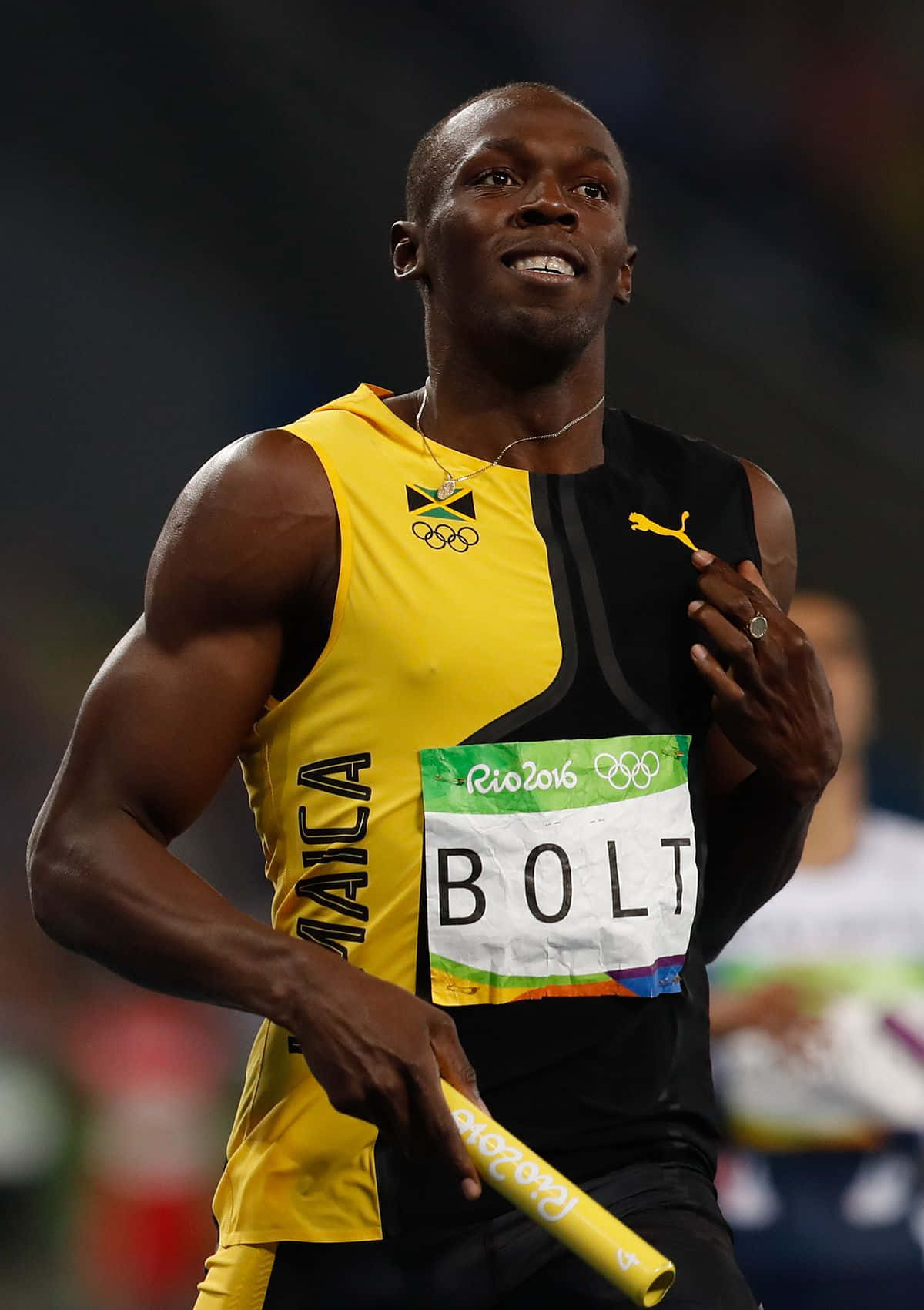 Usain Bolt In Black Yellow Shirt Background