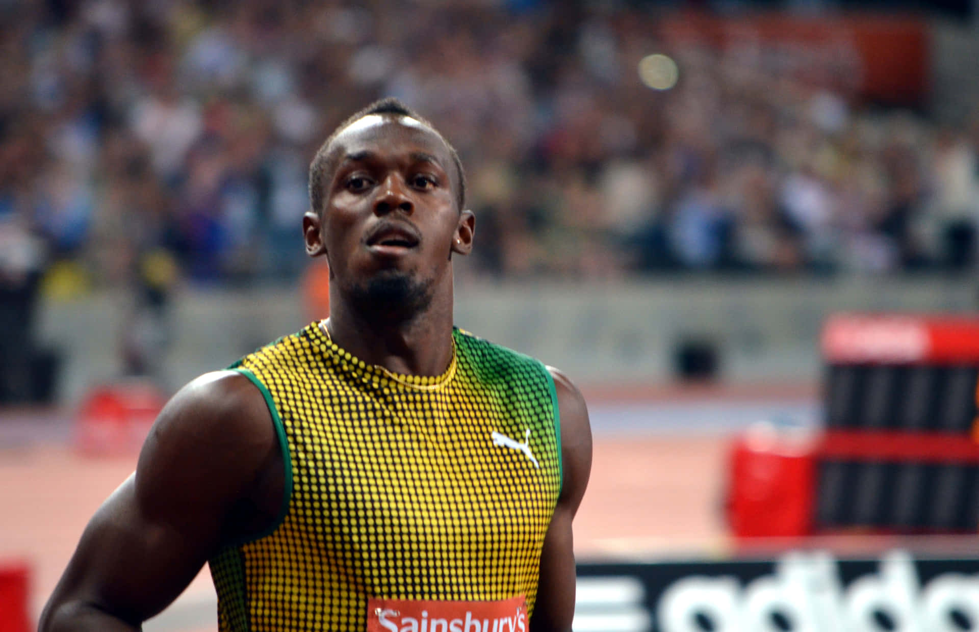 Usain Bolt Looking At The Camera Background