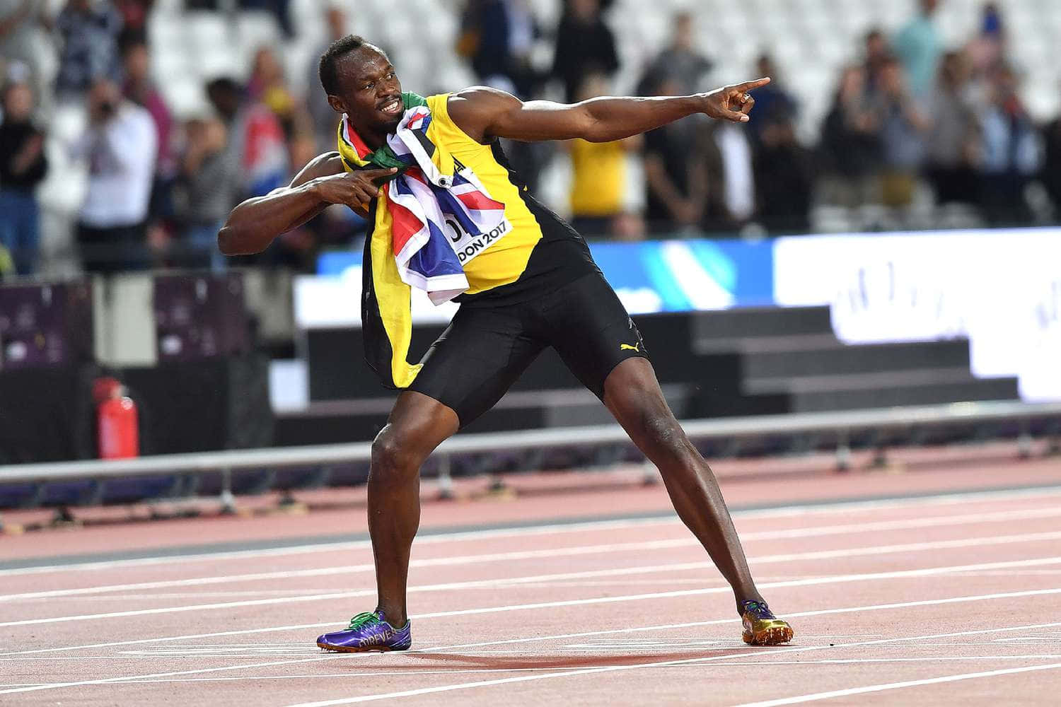 Usain Bolt Posing After Victory Background
