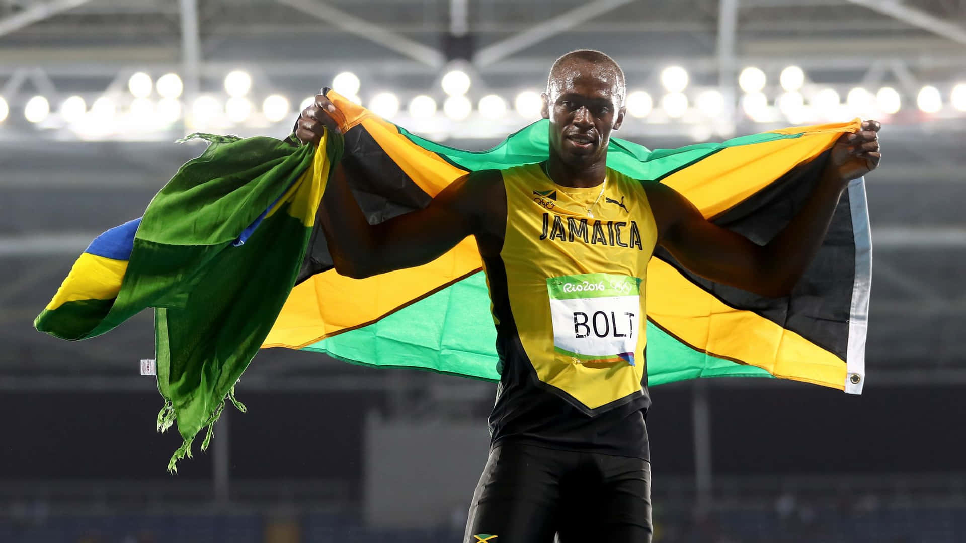 Usain Bolt Presenting The Jamaican Flag Background