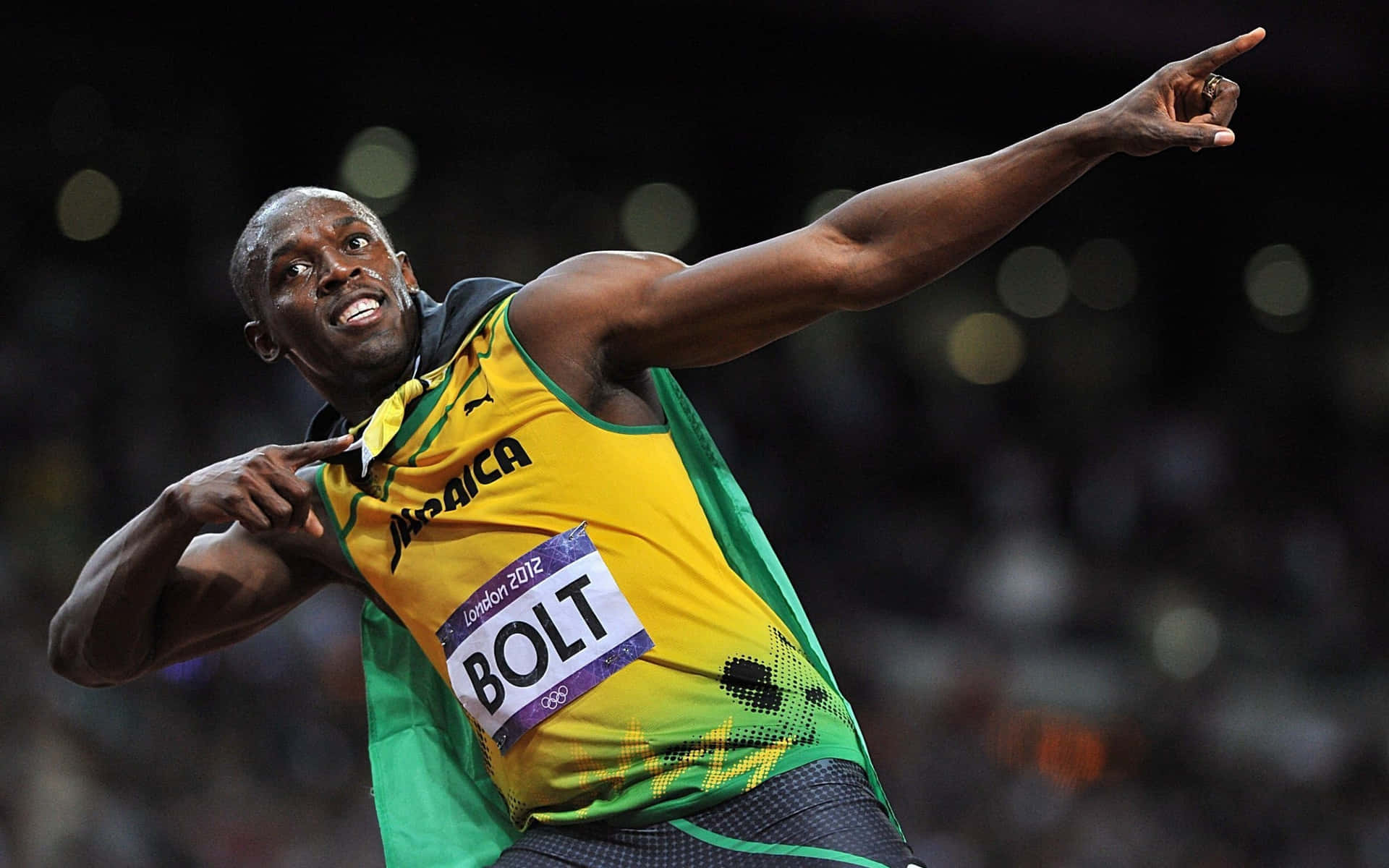 Usain Bolt Smiles And Strikes Pose Background