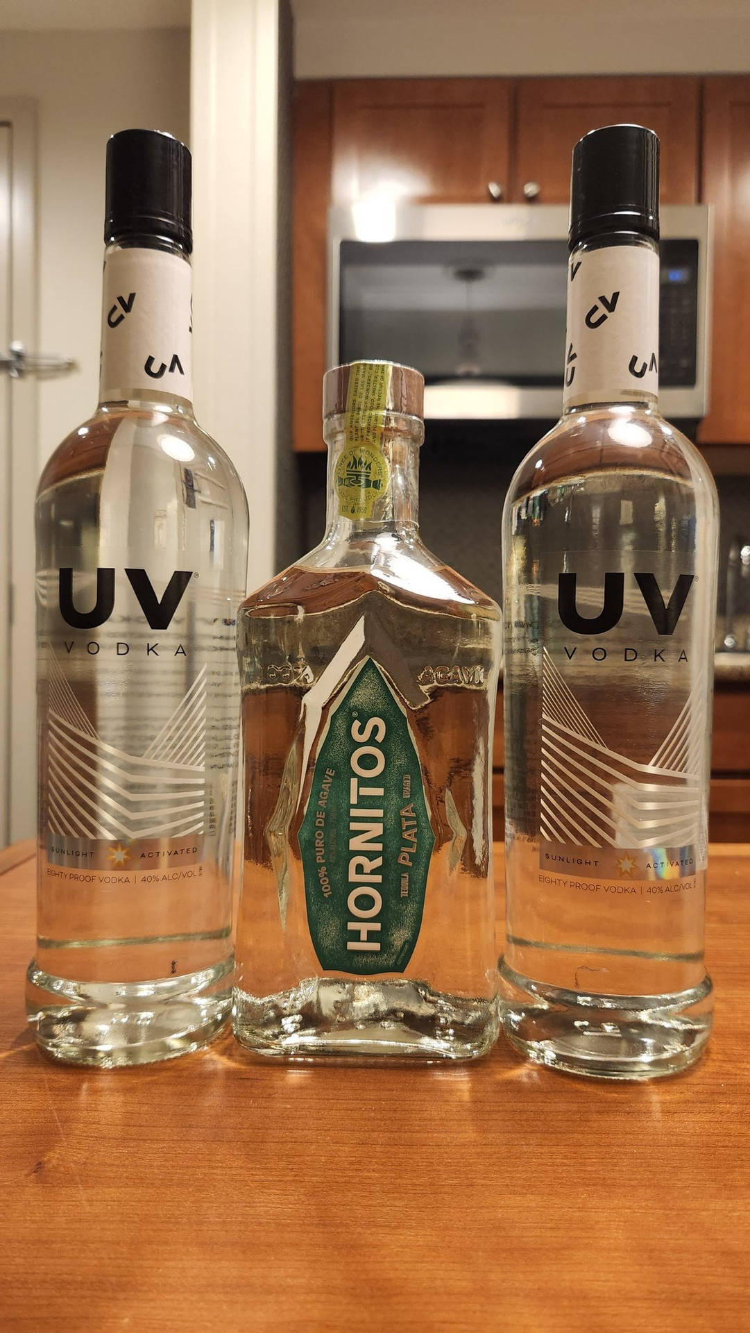 Uv Vodka And Hornitos Tequila Reposado Background