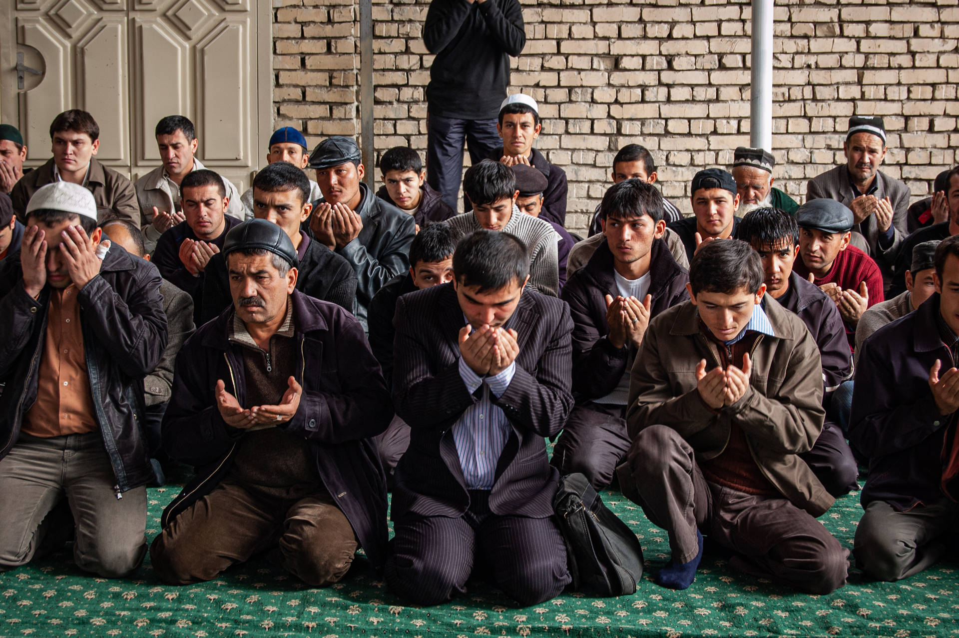 Uzbekistan Locals Praying In Mosque Background