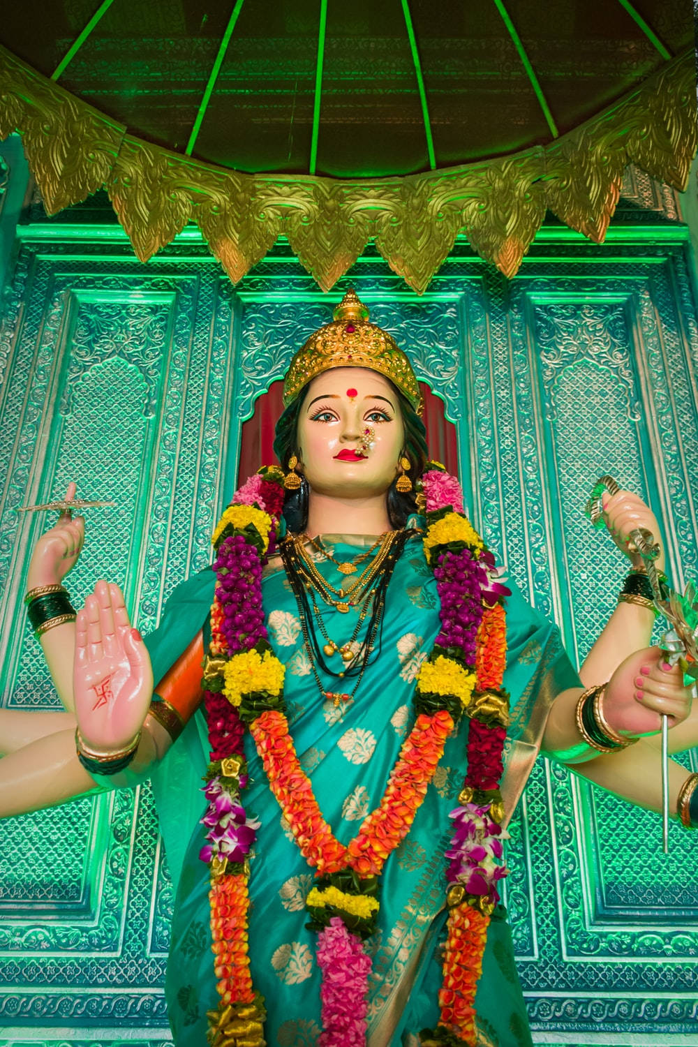 Vaishno Devi In A Blue Saree Background
