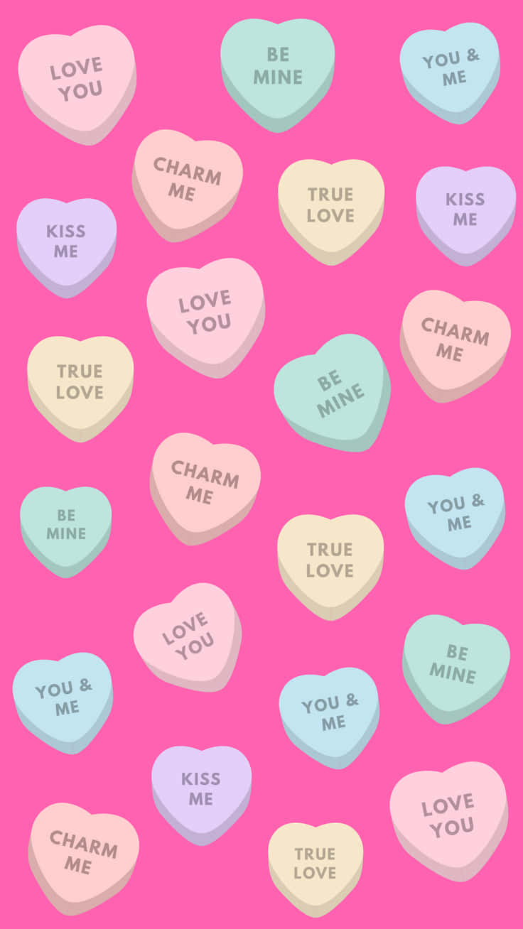 Valentine Candy Hearts On Pink Background Background